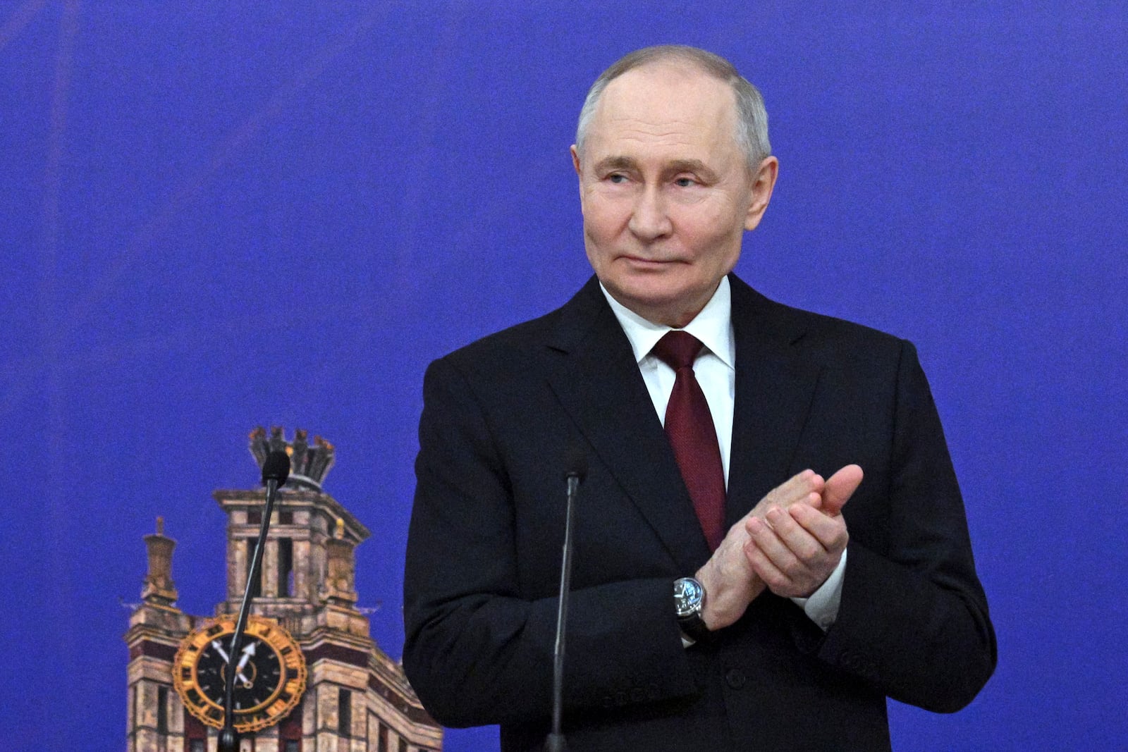 Russian President Vladimir Putin applauds while attending a ceremony to award the Order for Valiant Labour to the members of teaching staff during a meeting of the Board of Trustees of the Lomonosov Moscow State University in Moscow, Russia, Friday, Jan. 24, 2025. (Ramil Sitdikov, Sputnik, Kremlin Pool Photo via AP)