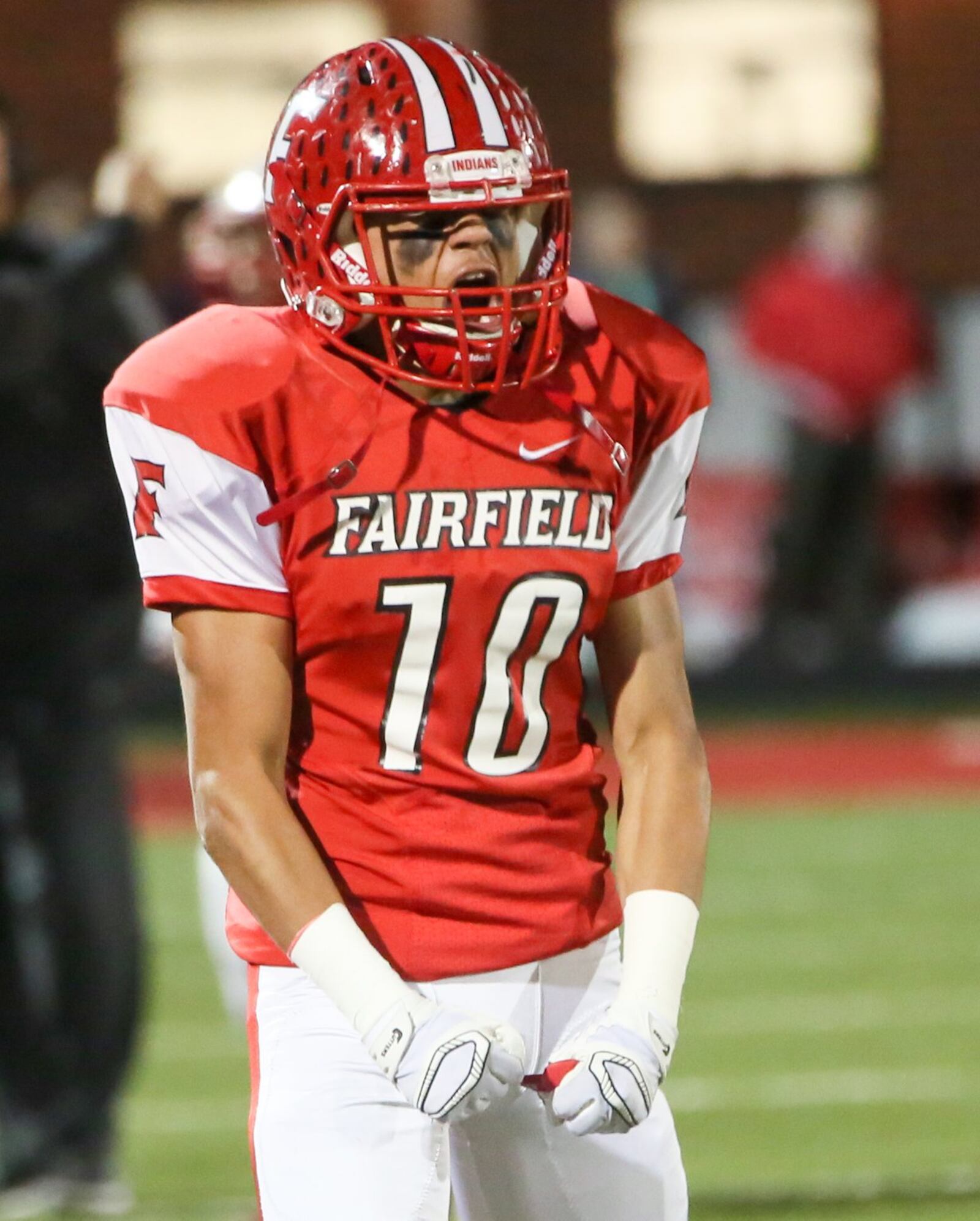 Fairfield defensive back Rudy Jones (10) celebrates a big play during their Division I playoff game against St. Xavier at Fairfield Stadium on Nov. 4, 2016. The visiting Bombers won 35-14. GREG LYNCH/STAFF