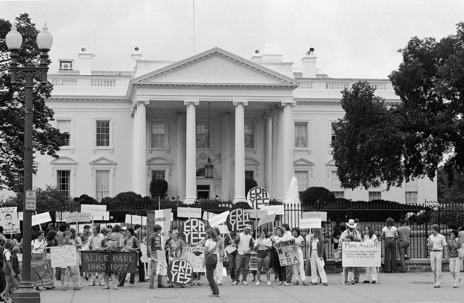 FILE - Equal Rights Amendment supporters display banners in front of the White House in Washington on Saturday, Aug. 22, 1981. (AP Photo/Taylor, File)