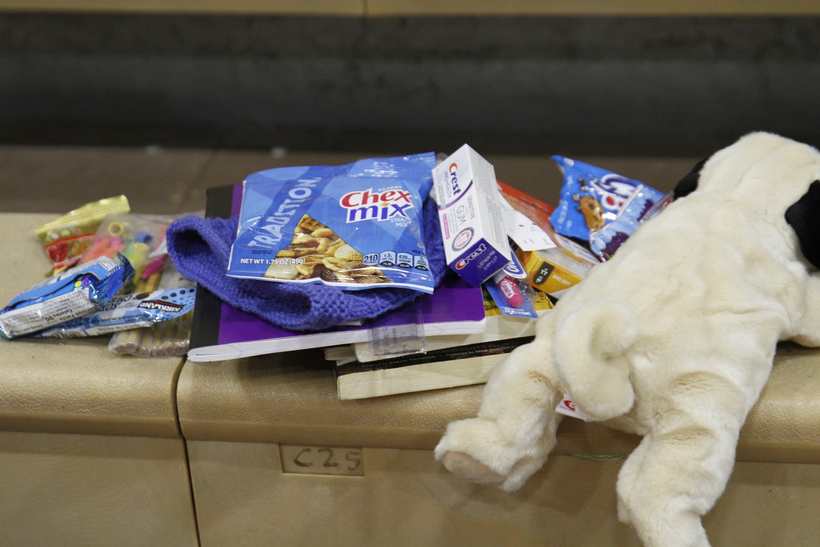 Gifts that were held in a backpacks distributed to children in Yakutat, Alaska, as part of the Alaska National Guard's Operation Santa initiative that brings Christmas to an Indigenous community that has suffered a hardship, Wednesday, Dec. 18, 2024. (AP Photo/Mark Thiessen)