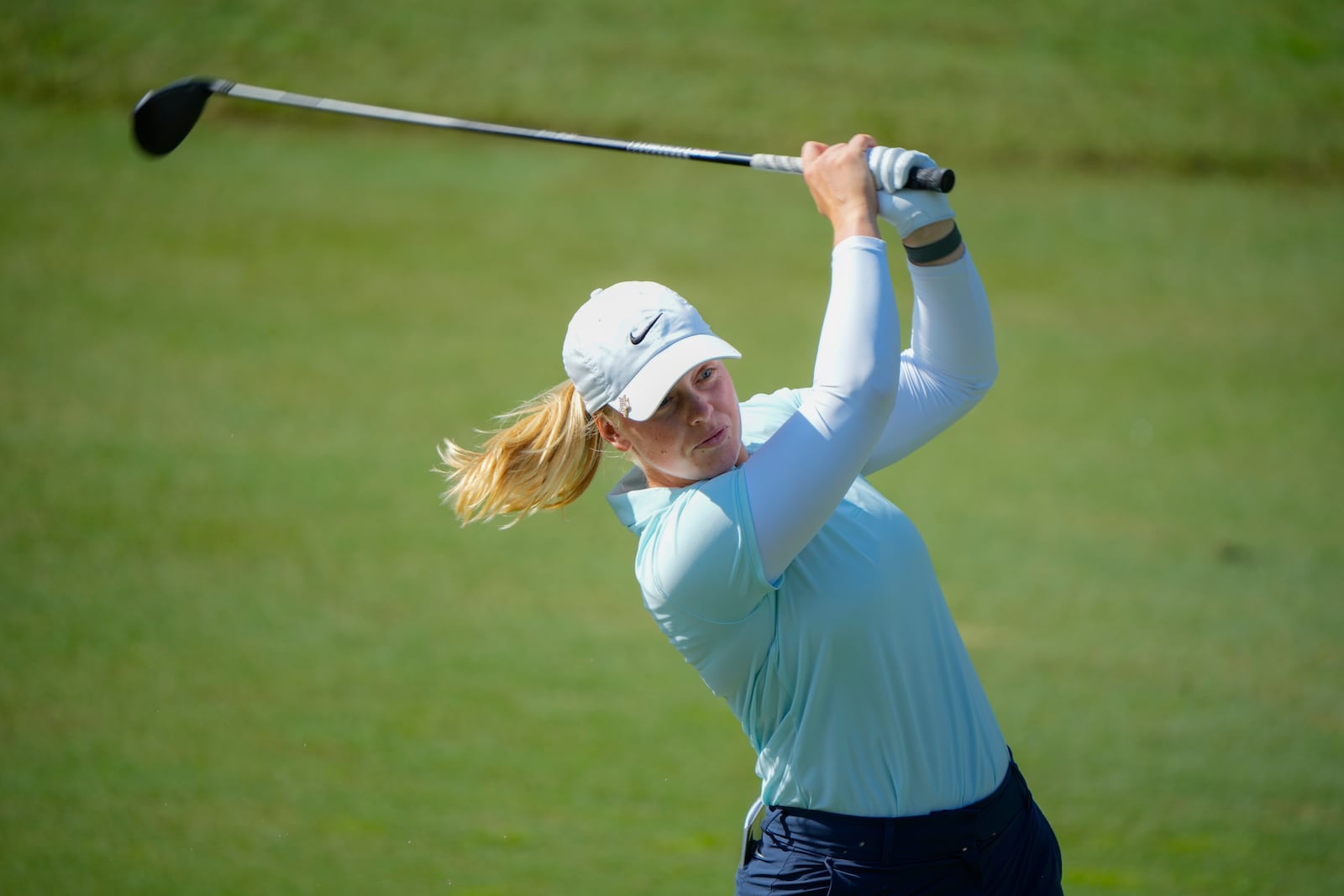 Maja Stark of Sweden watches her fairway shot on the third hole during the second round of Maybank LPGA Championship golf tournament at Kuala Lumpur Golf and Country club in Kuala Lumpur, Thursday, Oct. 24, 2024. (AP Photo/Vincent Thian)