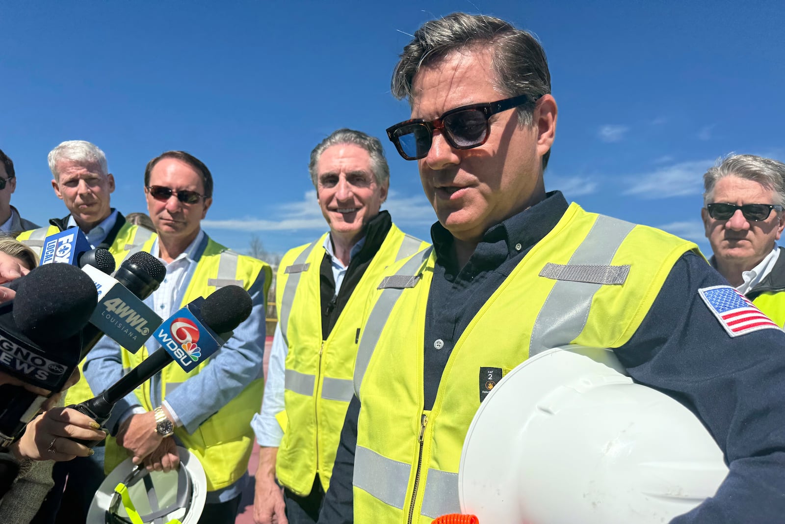 Venture Global CEO Michael Sabel speaks with media alongside at the company's liquified natural gas export facility alongside Secretary of the Interior Secretary Doug Burgum, Louisiana Governor Jeff Landry and Secretary of Energy Chris Wright, Thursday, March 6, 2025, in Plaquemines, La. (AP Photo/Jack Brook)