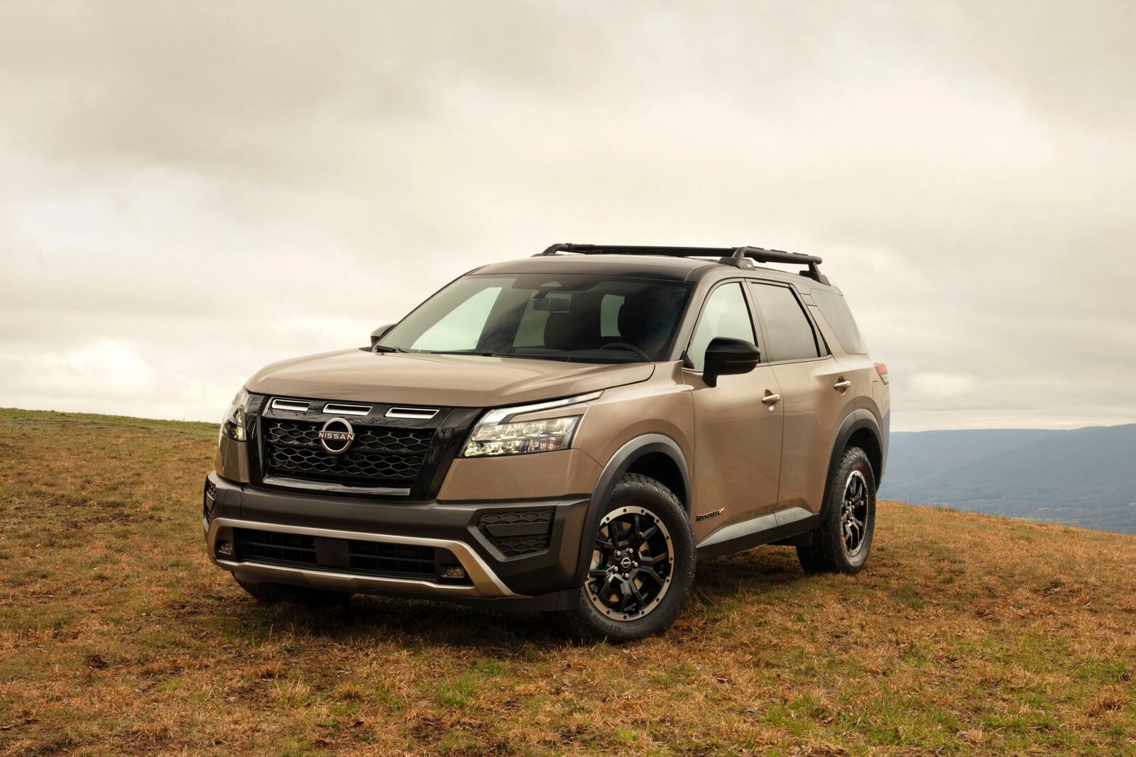 This photo provided by Nissan shows the 2025 Pathfinder. The Rock Creek version pictured here has all-terrain tires and a lifted suspension to provide a bit more off-road capability. (Nissan North America via AP)