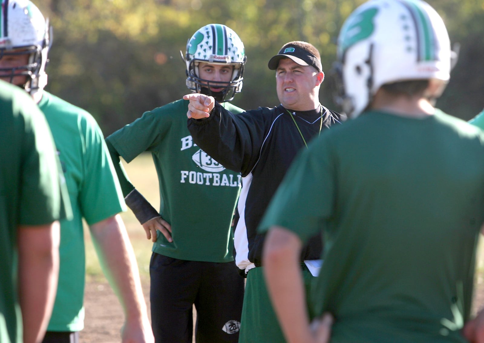 Dave Wirth makes a point during a Badin High School football practice Oct. 30, 2008, at the school. GREG LYNCH/STAFF