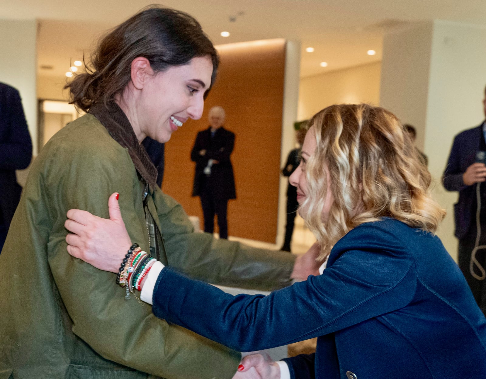 Cecilia Sala, left, an Italian journalist who was detained on Dec. 19 as she was reporting in Iran, is welcomed by Italian Premier Giorgia Meloni as she landed at Rome' Ciampino airport after being released, Wednesday, Jan. 8, 2025. (Filippo Attili, Italian Government Office via Ap )