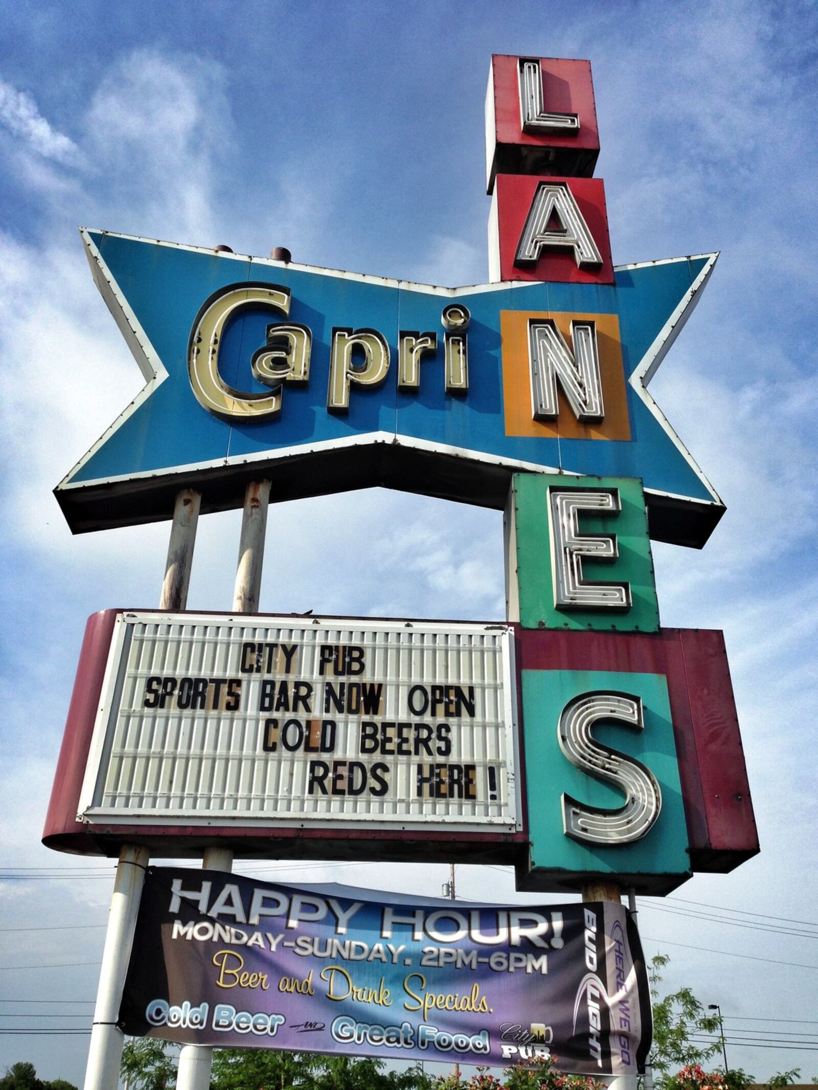 The City Pub at Capri Lanes in Kettering is ready to serve you. “I have lived within a few blocks of this fine emporium of bowling for more than 20 years and have rolled the ball there several times, but had no idea it offered such a wide selection of food and beverages,” said Brother Jim of The Leadbelly Boys. “How did I not know?!” (Staff photo by Connie Post)