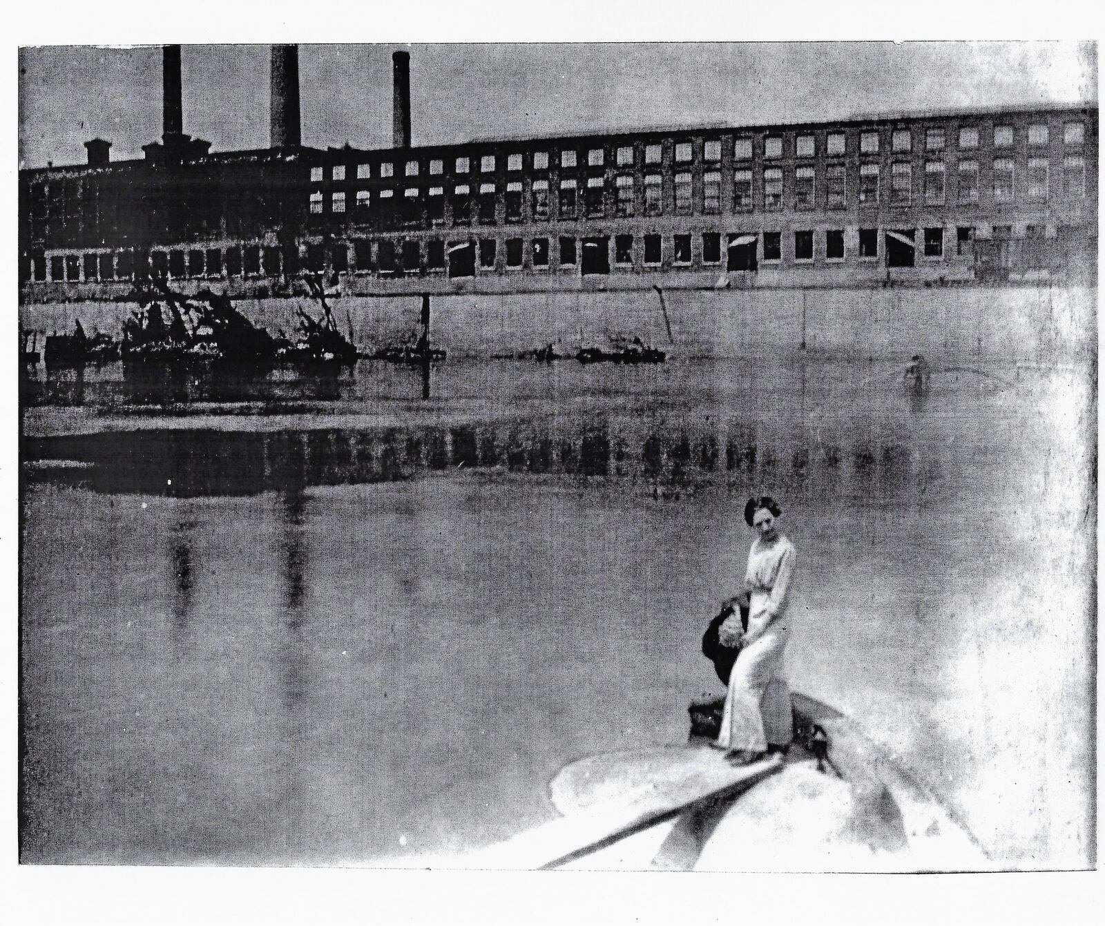 This historic photo of the Champion Paper Mill shows how many windows the facility once had. Bricked over now, they will be reopened as part of the Spooky Nook at Champion Mill project.