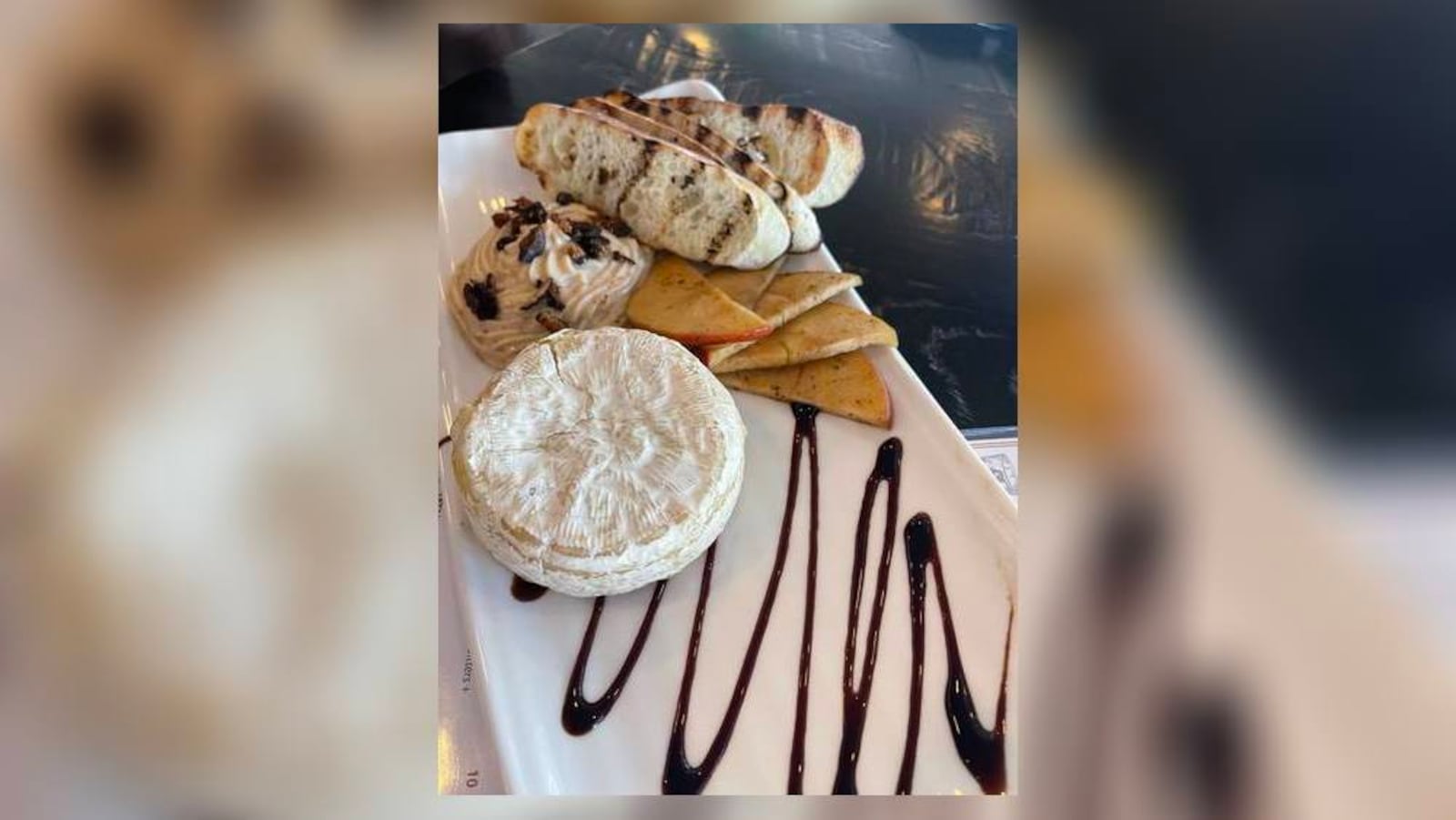 National Cheese Lover's Day happens annually on Jan. 20. This photo shows a brie appetizer at Tano Bistro in Hamilton, Ohio. STAFF FILE PHOTO