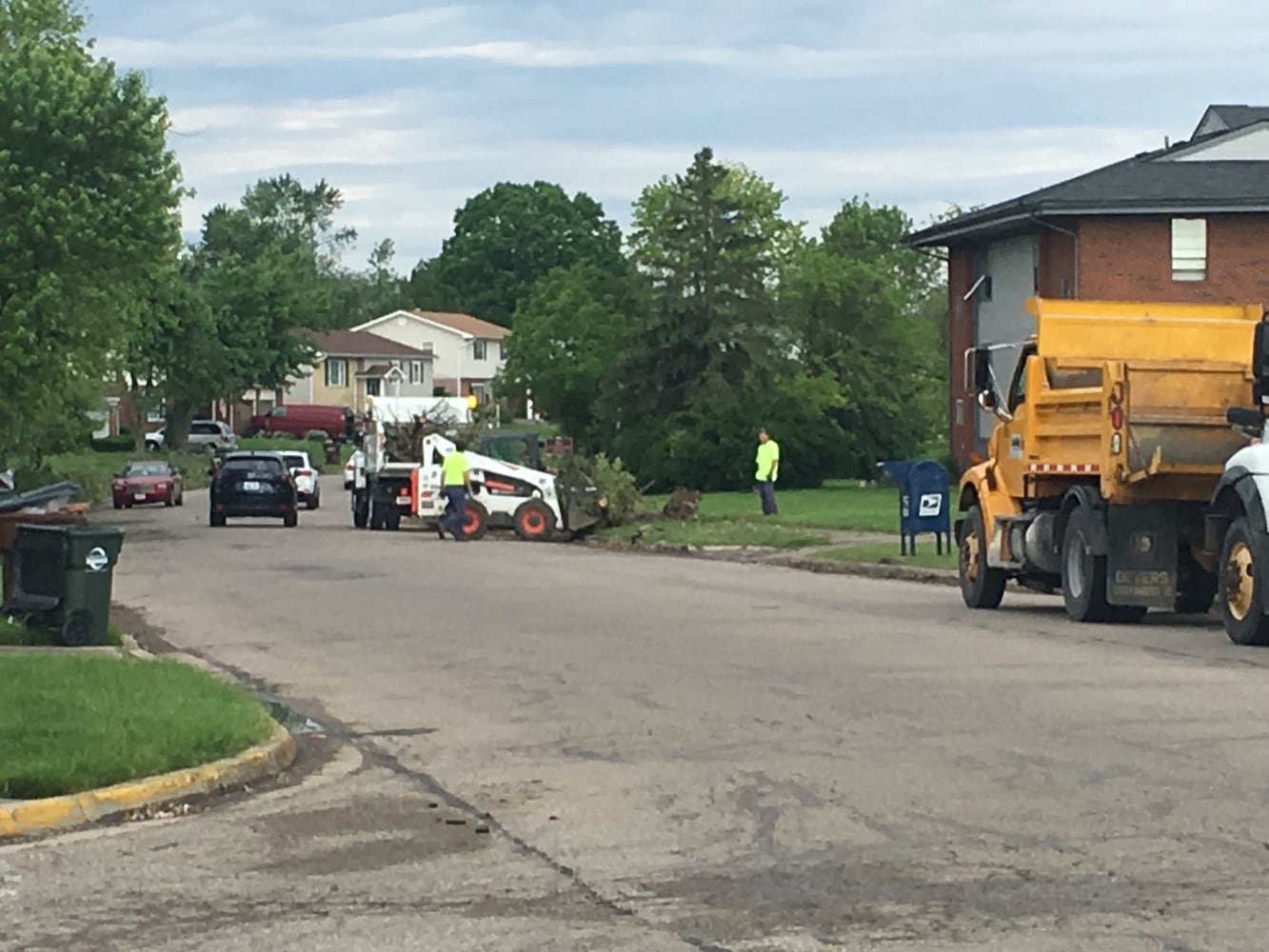 PHOTOS: Tornado-damaged communities dig out, clean up