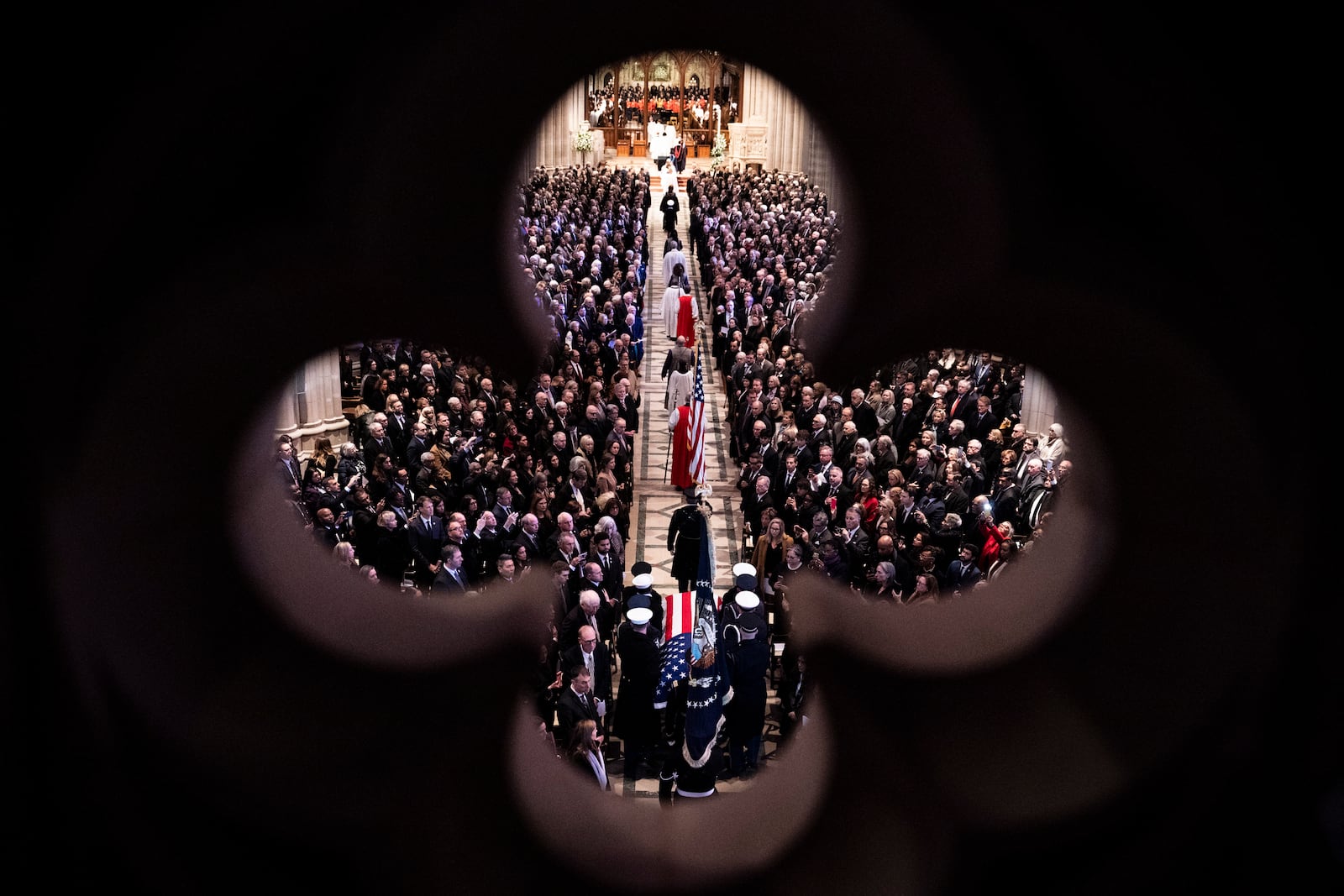 The casket of former President Jimmy Carter arrives for a state funeral at the National Cathedral, Thursday, Jan. 9, 2025, in Washington. (Haiyun Jiang/The New York Times via AP, Pool)