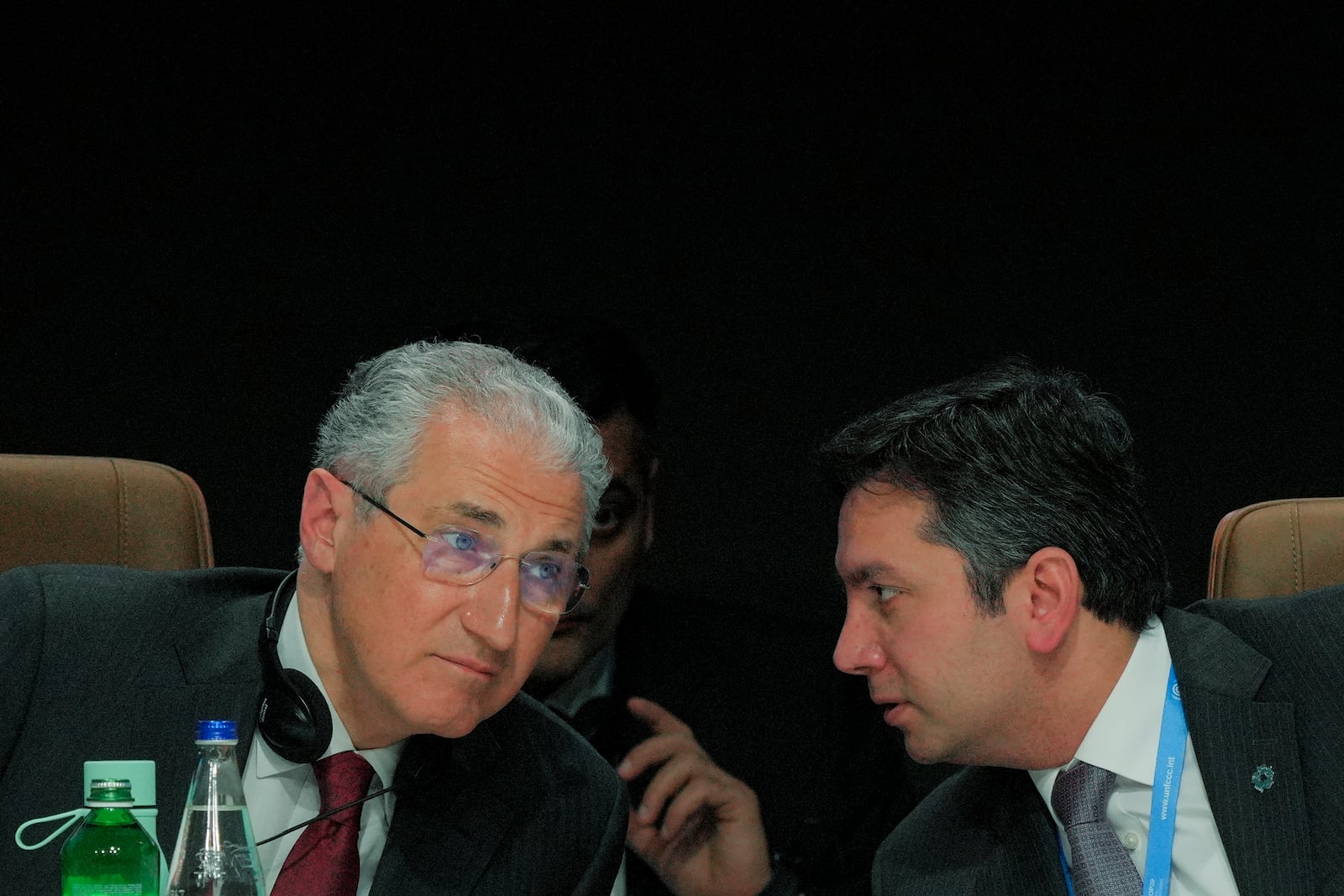 Mukhtar Babayev, COP29 President, left, and Yalchin Rafiyev, Azerbaijan's COP29 lead negotiator, speak during a plenary session at the COP29 U.N. Climate Summit, Thursday, Nov. 21, 2024, in Baku, Azerbaijan. (AP Photo/Peter Dejong)