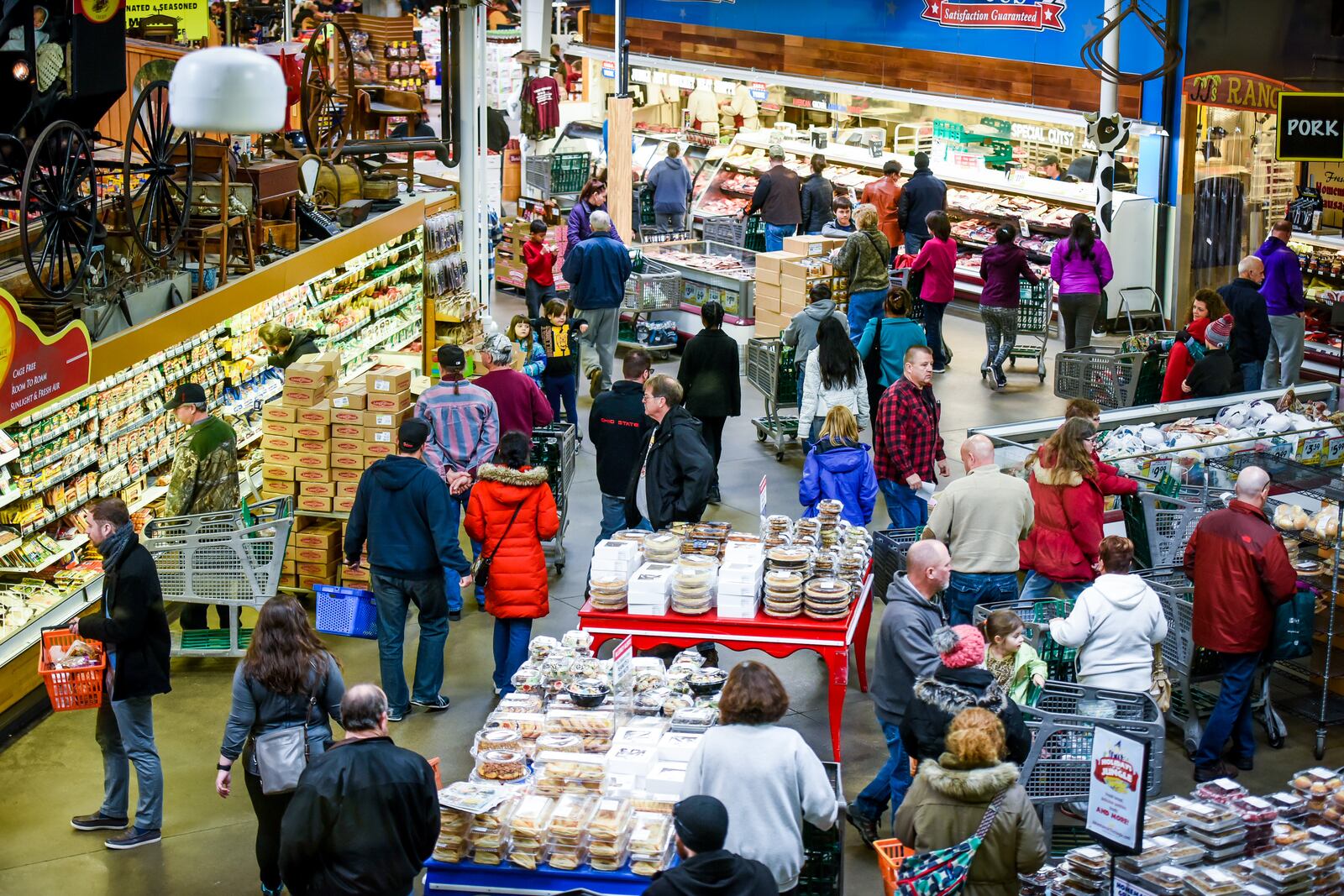 Shoppers pack the aisles at Jungle Jim’s International Market. NICK GRAHAM/STAFF