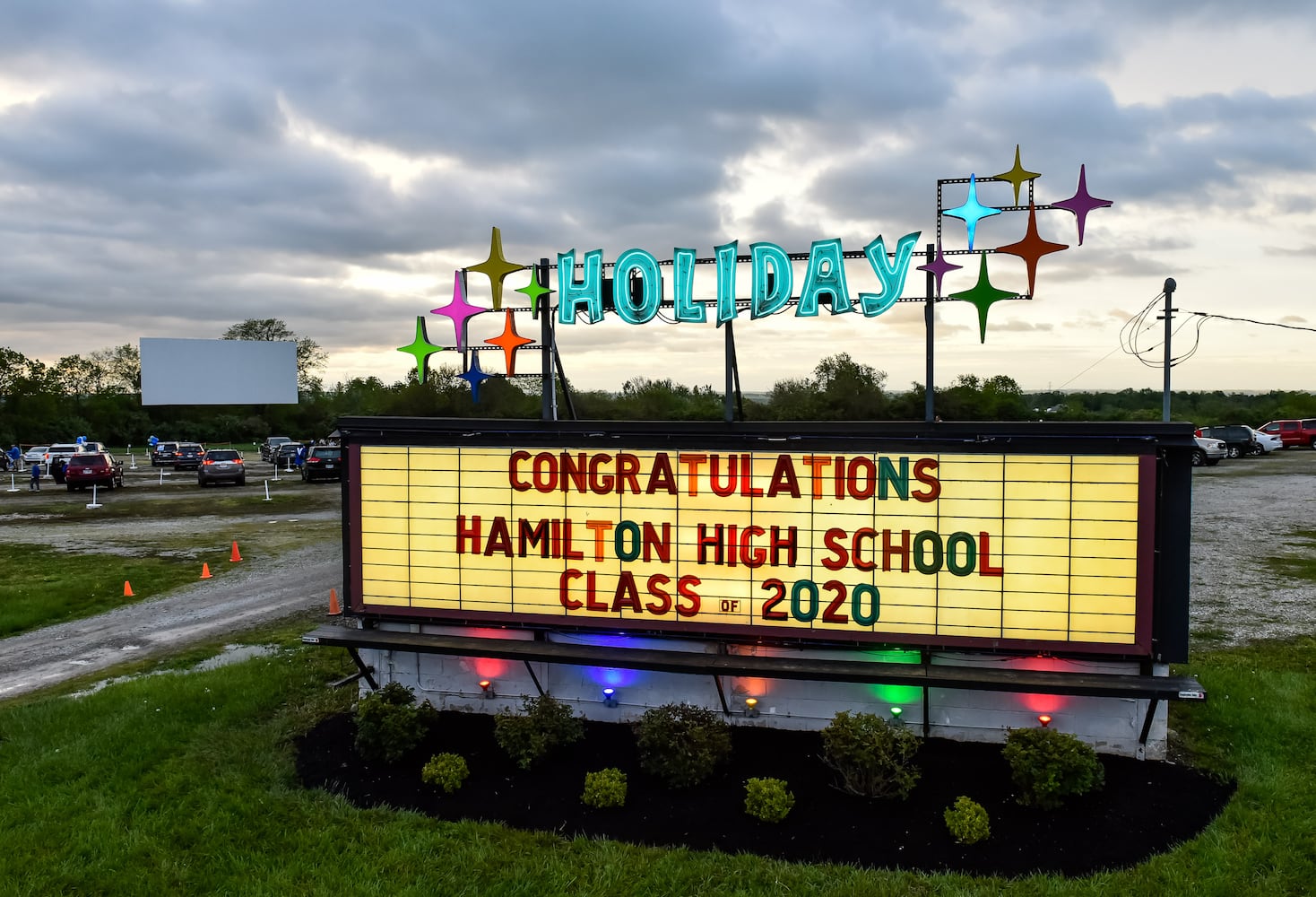 Hamilton High School seniors celebrate graduation at Holiday Auto Theatre drive-in