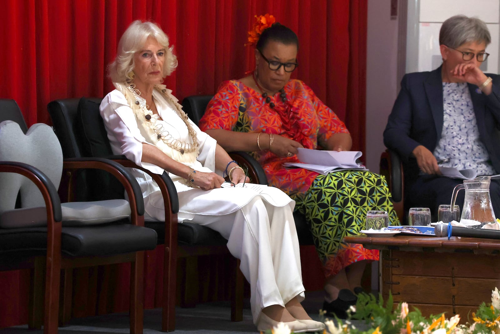 Britain's Queen Camilla, left, attends the Commonwealth Heads of Government Meeting (CHOGM) Women's Forum side-event in Apia, Samoa Thursday, Oct. 24, 2024. (Manaui Faulalo/Pool Photo via AP)