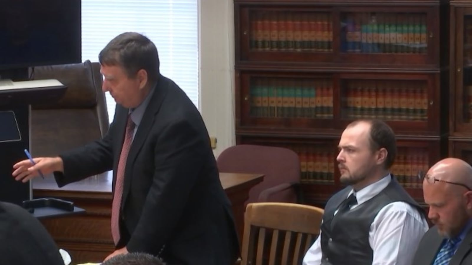 George Wagner IV, middle, is seen in court with his attorneys Wed., Sept. 14, 2022. Wagner is on trial for charges of murder in the deaths of eight members of the Rhoden family in Pike County, Ohio in 2016. WCPO/CONTRIBUTED