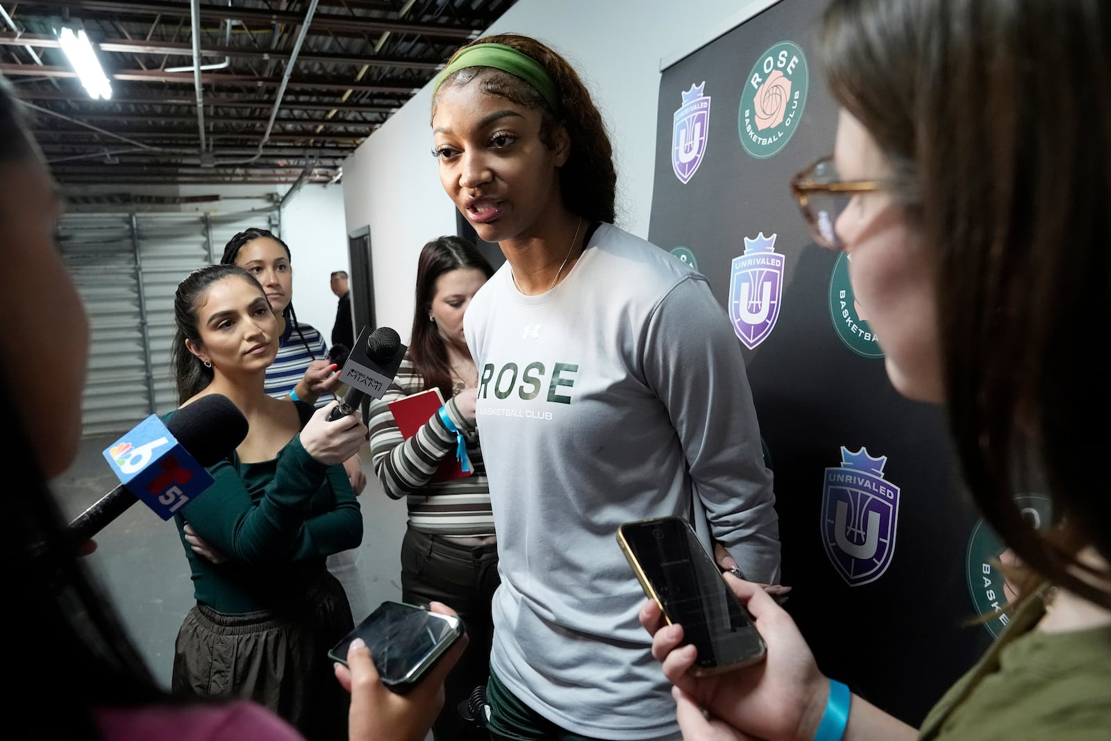 Rose player Angel Reese speaks following a practice session, Thursday, Jan. 16, 2025, in Medley, Fla., as the new 3-on-3 women's basketball league Unrivaled tips off this weekend. (AP Photo/Marta Lavandier)