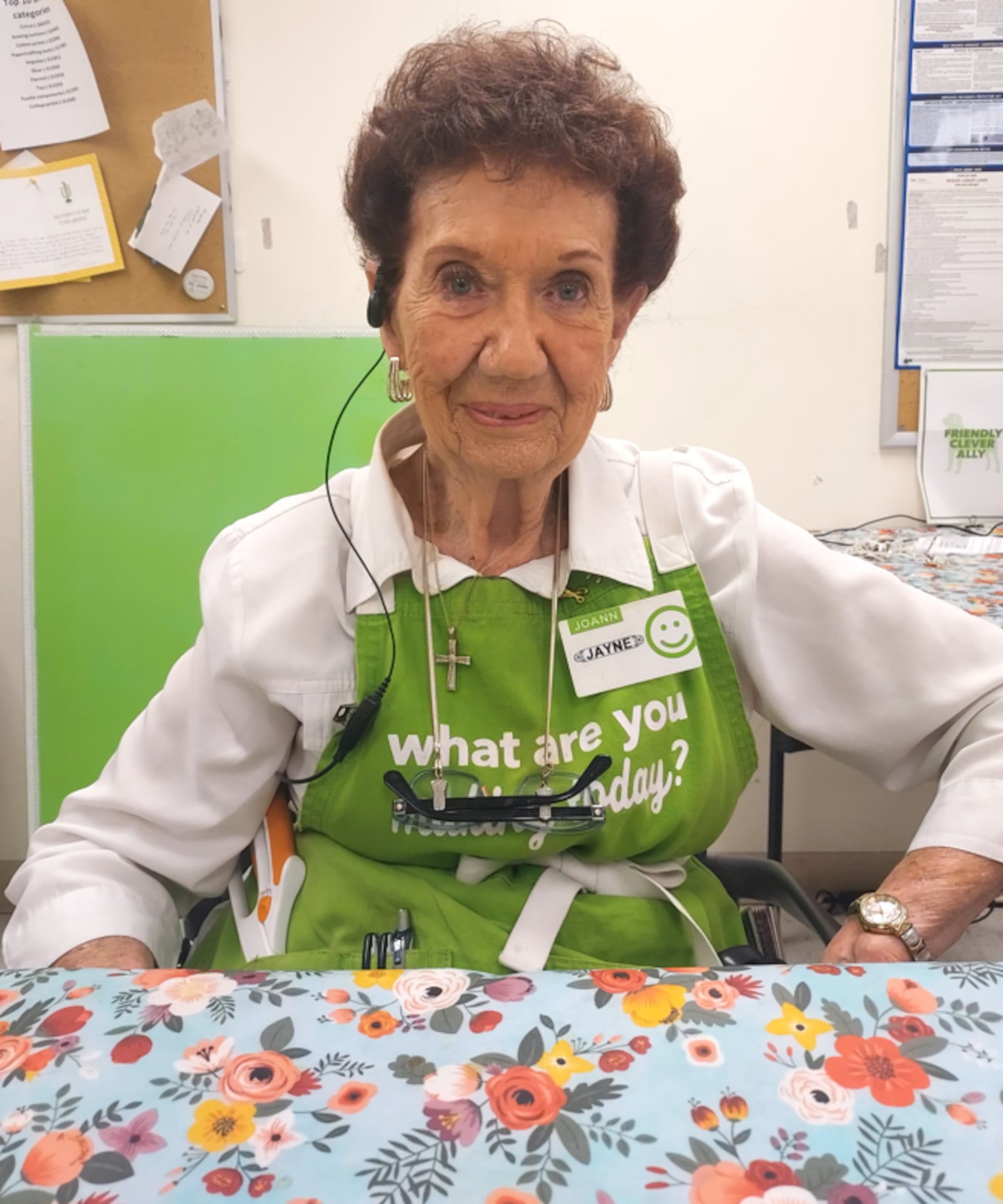 Jayne Burns, 101, is a worker at a Mason store where she cuts fabric. CONTRIBUTED