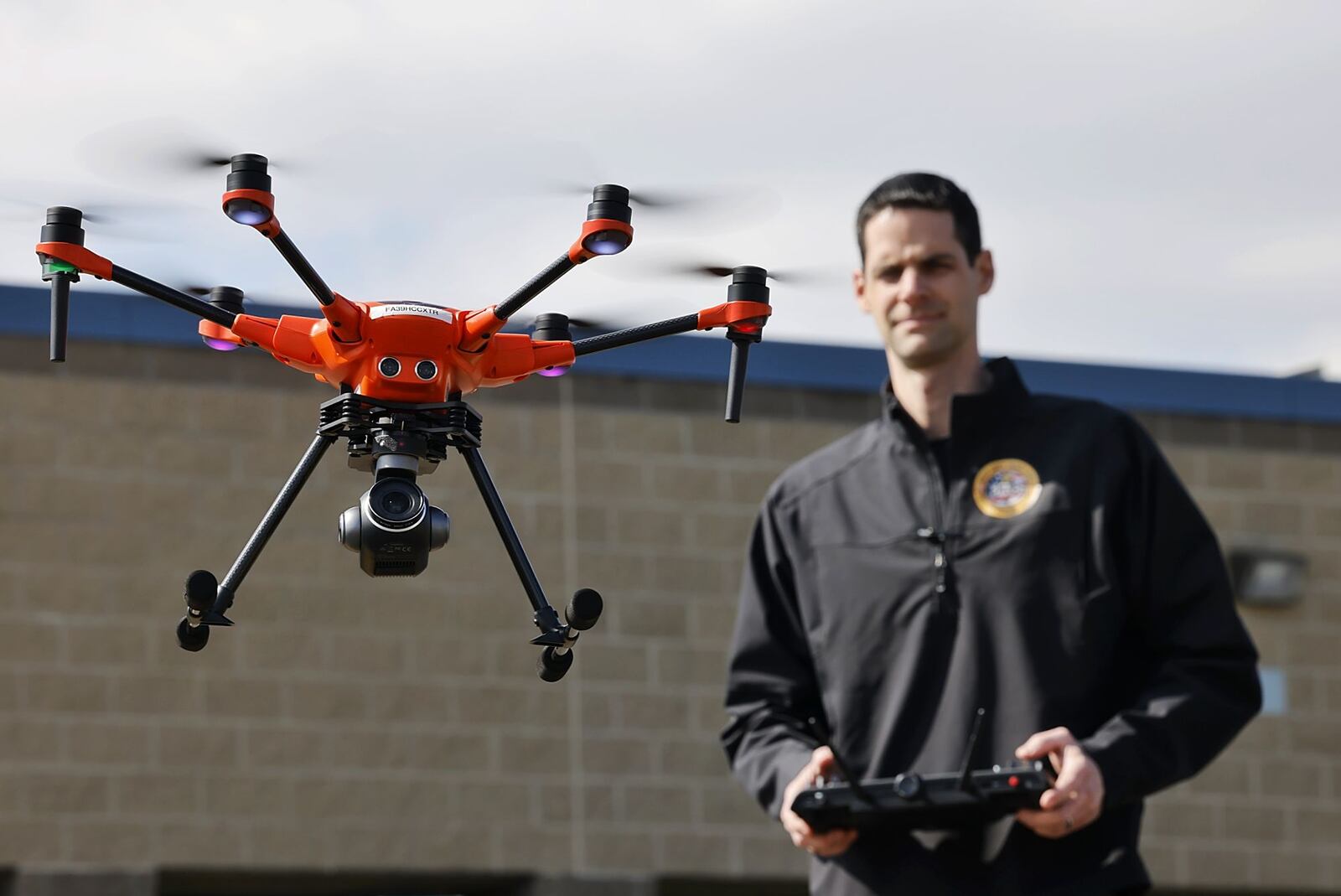 Butler County Sheriff's Office Sgt. Steve Poff shows one of their drones Wednesday, March 9, 2022 in Hamilton. NICK GRAHAM/STAFF