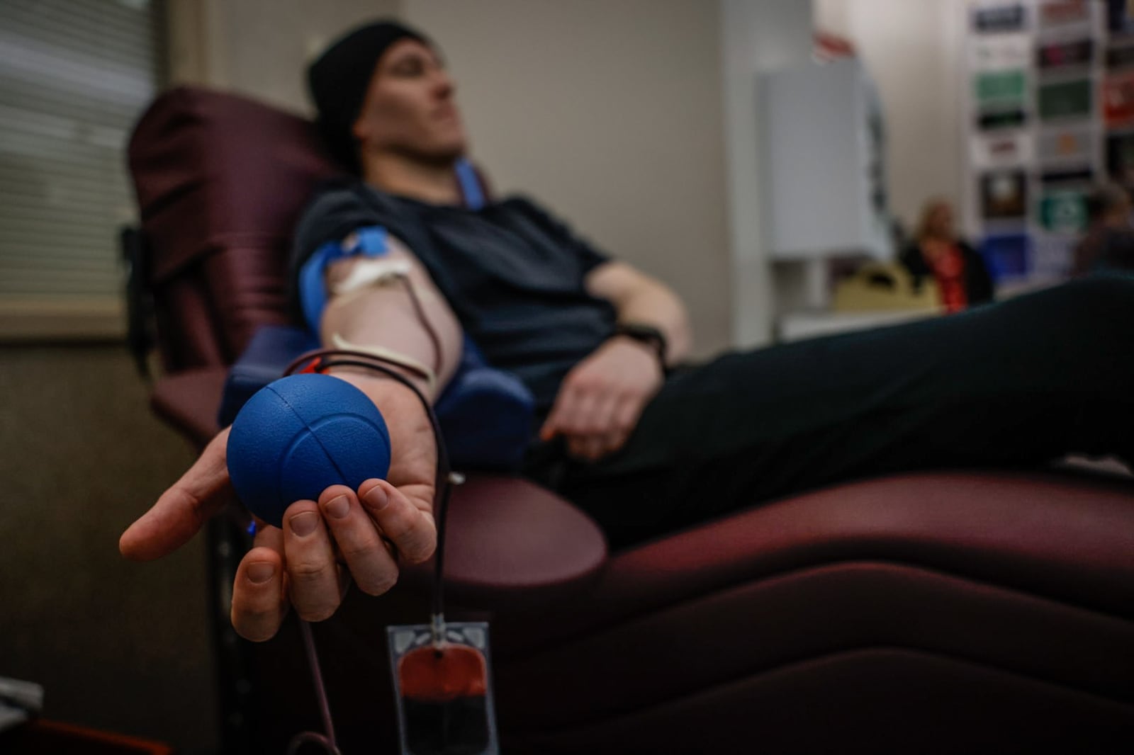 Todd Geglein from Dayton donates whole blood at the Dayton Blood Center on Tuesday January 9, 2024. The Dayton region is in critical need of certain blood types. JIM NOELKER/STAFF