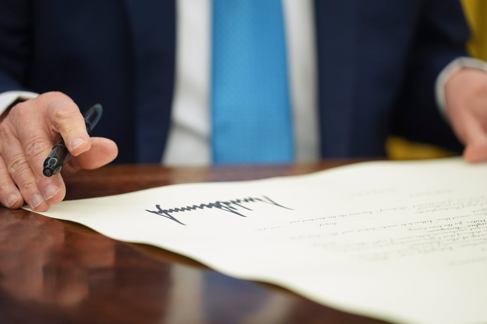 FILE - President Donald Trump pauses after signing an executive order in the Oval Office of the White House in Washington, Friday, Jan. 31, 2025. (AP Photo/Evan Vucci, File)