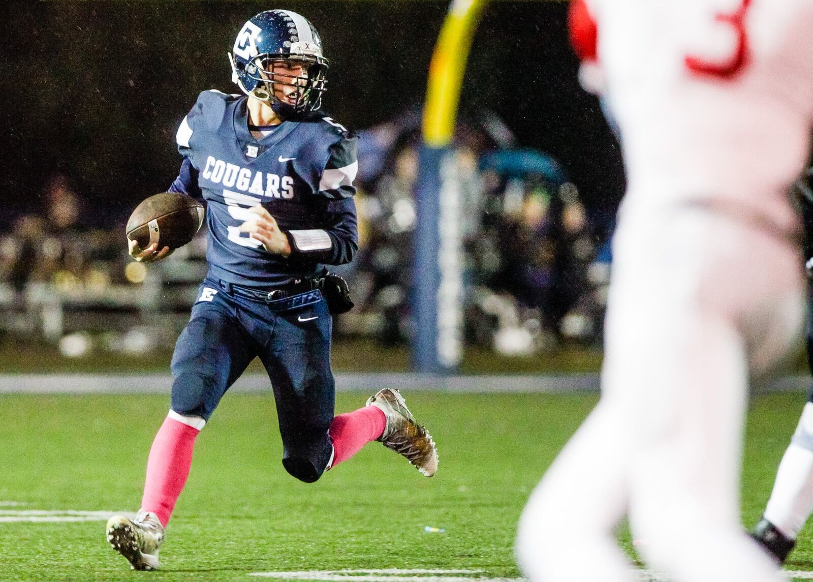 Edgewood quarterback Corbin Craft looks for running room during Friday night’s game against visiting Mount Healthy at Kumler Field in St. Clair Township. NICK GRAHAM/STAFF