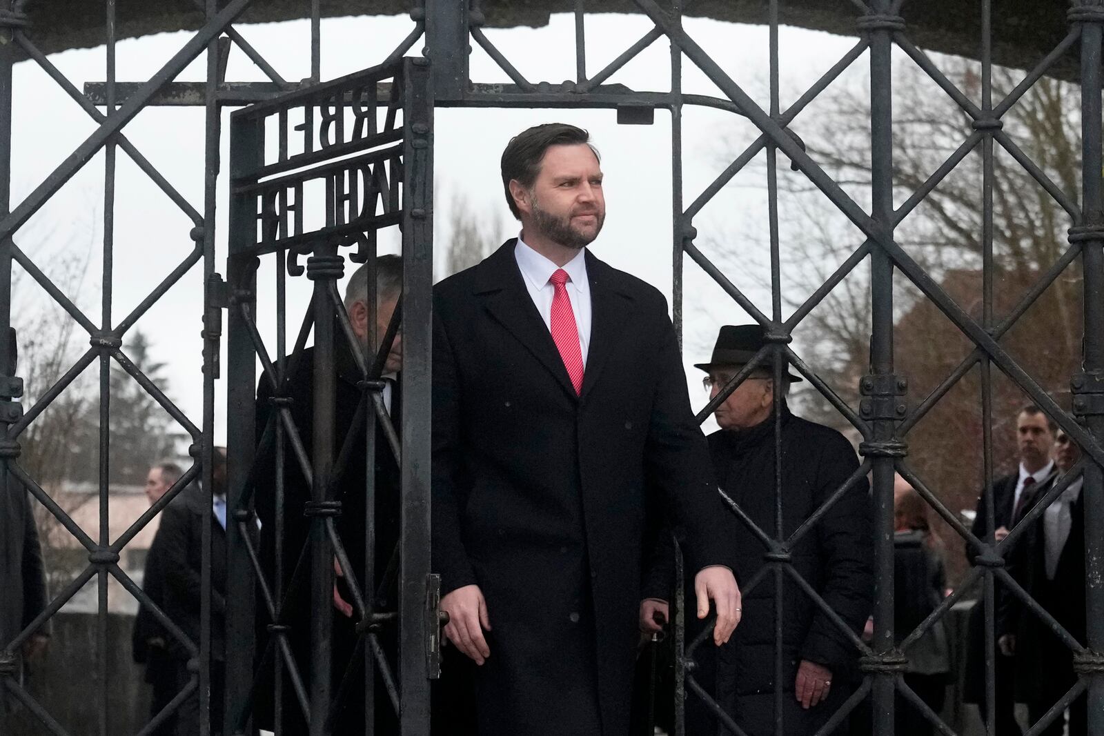 U.S. Vice President JD Vance enters the Dachau Concentration Camp Memorial Site outside Munich, Germany, Thursday, Feb. 13, 2025. (AP Photo/Matthias Schrader)