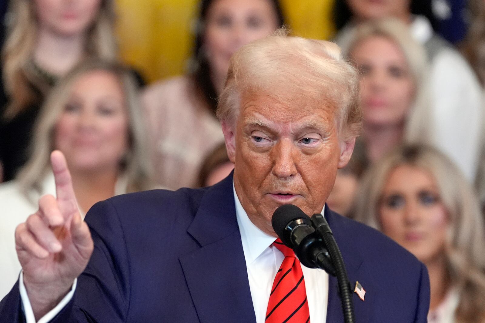 President Donald Trump speaks before signing an executive order barring transgender female athletes from competing in women's or girls' sporting events, in the East Room of the White House, Wednesday, Feb. 5, 2025, in Washington. (AP Photo/Alex Brandon)