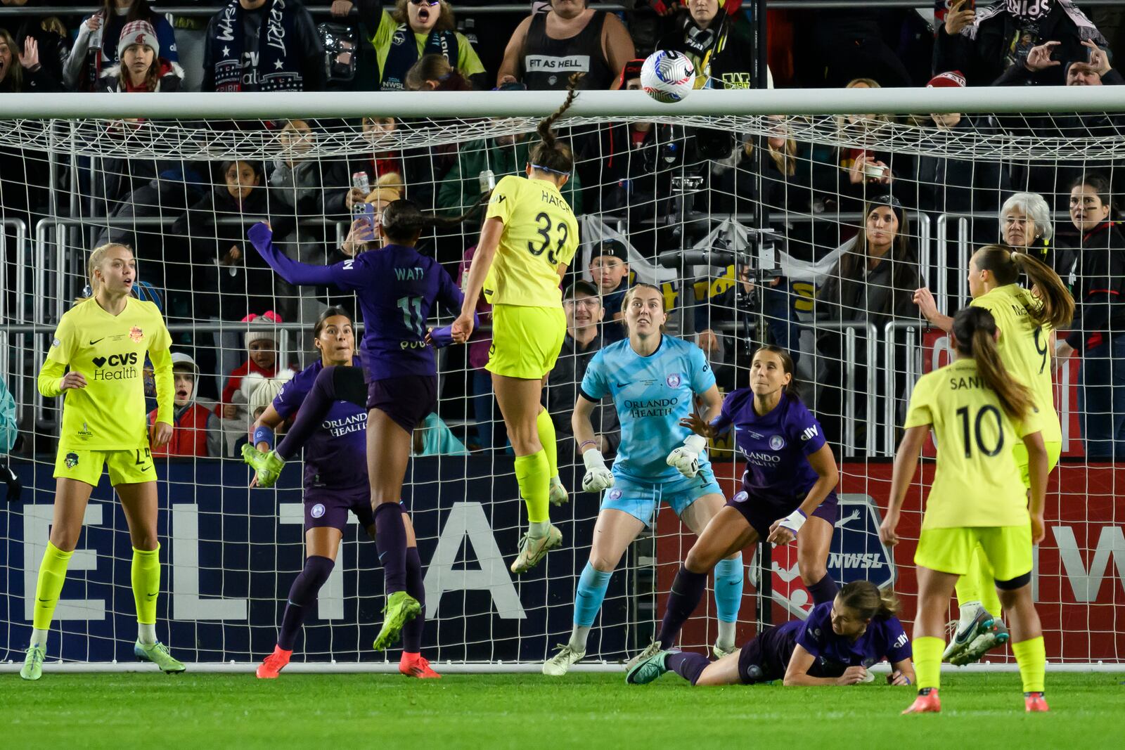 Washington Spirit forward Ashley Hatch (33) tries to head the ball into the goal during the second half of the NWSL championship against the Orlando Pride at CPKC Stadium, Saturday, November 23, 2024, in Kansas City, Mo. (AP Photo/Reed Hoffmann)