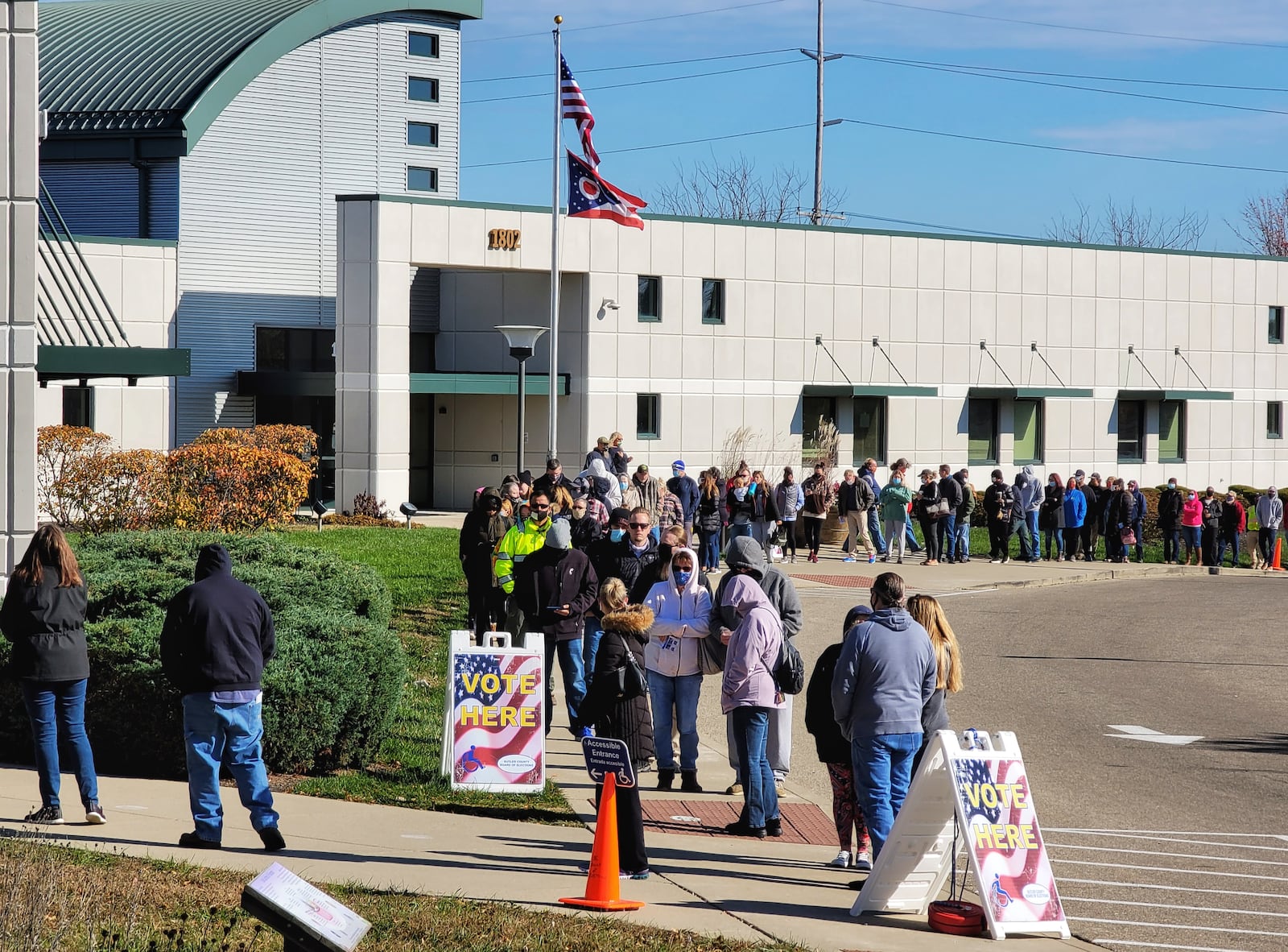 A long line forms on the last day of early voting at the Butler County Board of Elections Monday, Nov. 2, 2020 in Hamilton. NICK GRAHAM / STAFF