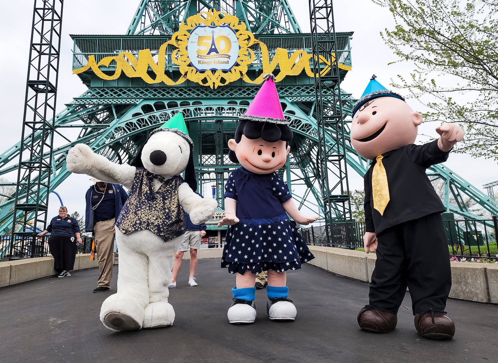 Peanuts characters dance as Kings Island held an opening ceremony and ribbon cutting Friday, April 29, 2022 in celebration of their 50th Anniversary. NICK GRAHAM/STAFF