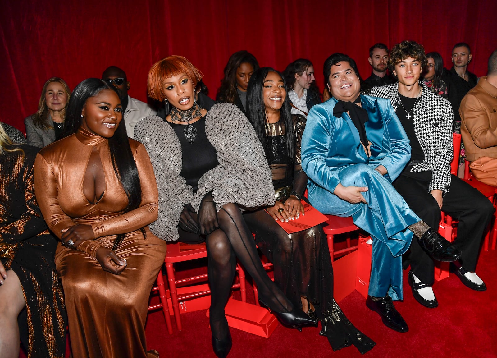 Danielle Brooks, from left, Laverne Cox, Tiffany Haddish, Harvey Guillen and Gavin Casalegno attend the Christian Siriano Fall/Winter 2025 fashion show at Chelsea Industrial during New York Fashion Week on Thursday, Feb. 6, 2025, in New York. (Photo by Evan Agostini/Invision/AP)