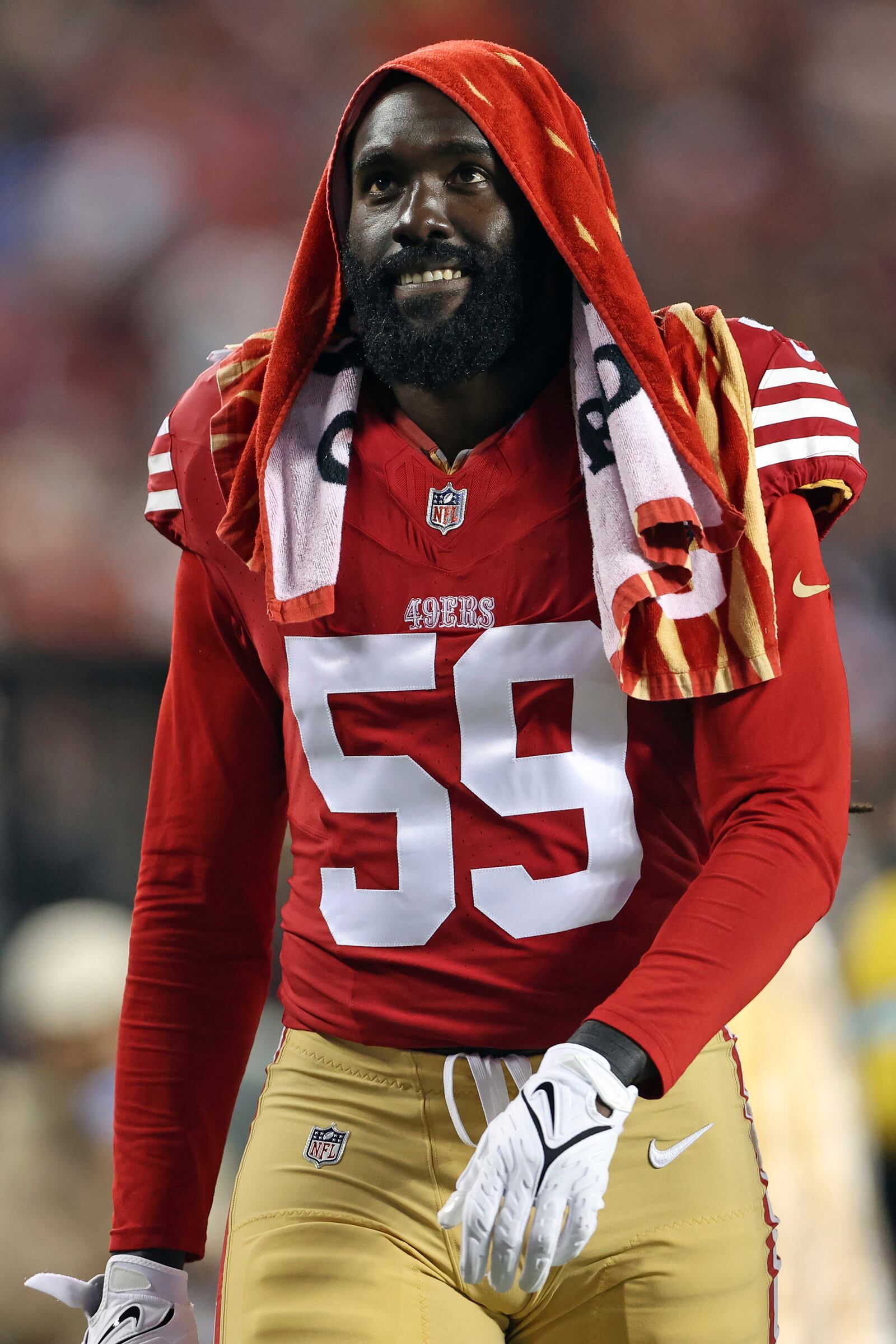 San Francisco 49ers' De'Vondre Campbell walks to the locker room during the second half of an NFL football game against the Los Angeles Rams in Santa Clara, Calif., Thursday, Dec. 12, 2024. (Scott Strazzante/San Francisco Chronicle via AP)