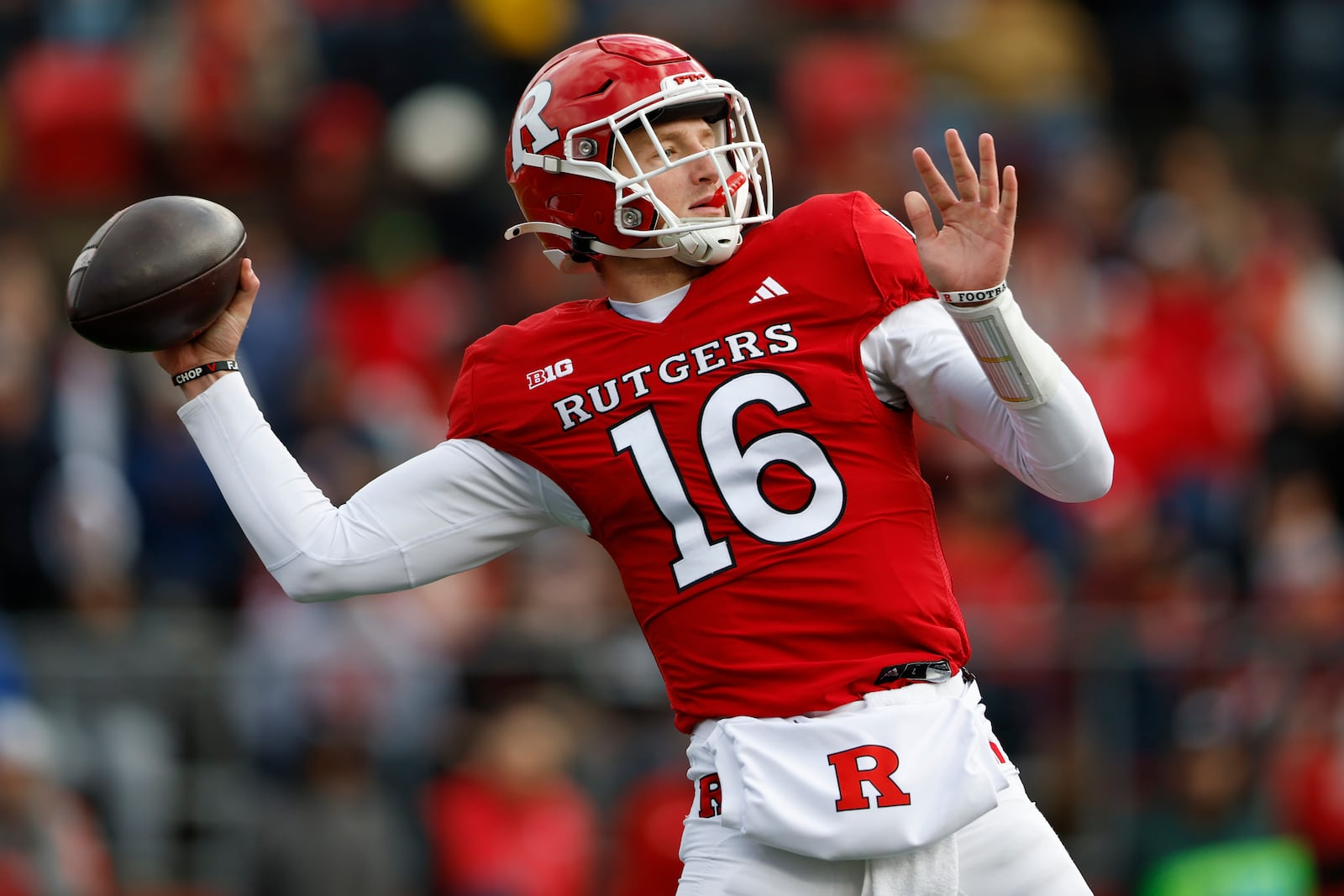 Rutgers quarterback Athan Kaliakmanis attempts a pass against Illinois during the first half of an NCAA college football game, Saturday, Nov. 23, 2024, in Piscataway, N.J. (AP Photo/Rich Schultz)