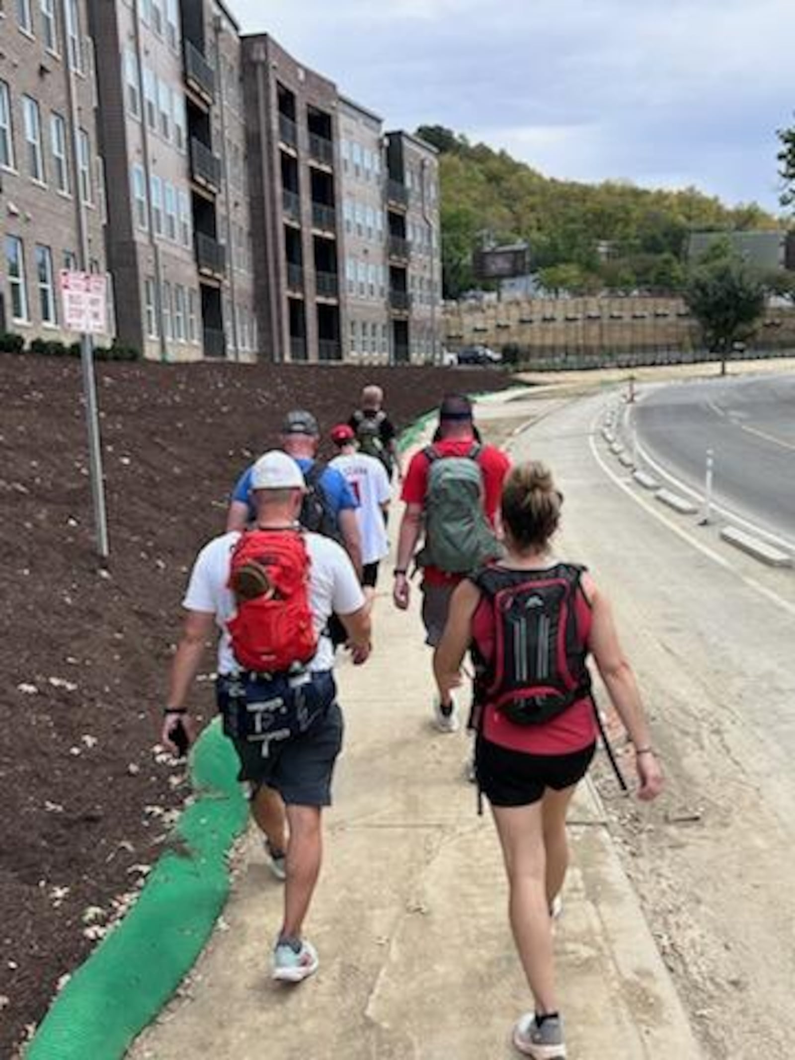 Eight people walked the 21 miles from Fairfield to Great Amercan Ball Park Tuesday to raise funds and awareness for the Joe Nuxhall Miracle Fields. SUBMITTED PHOTO