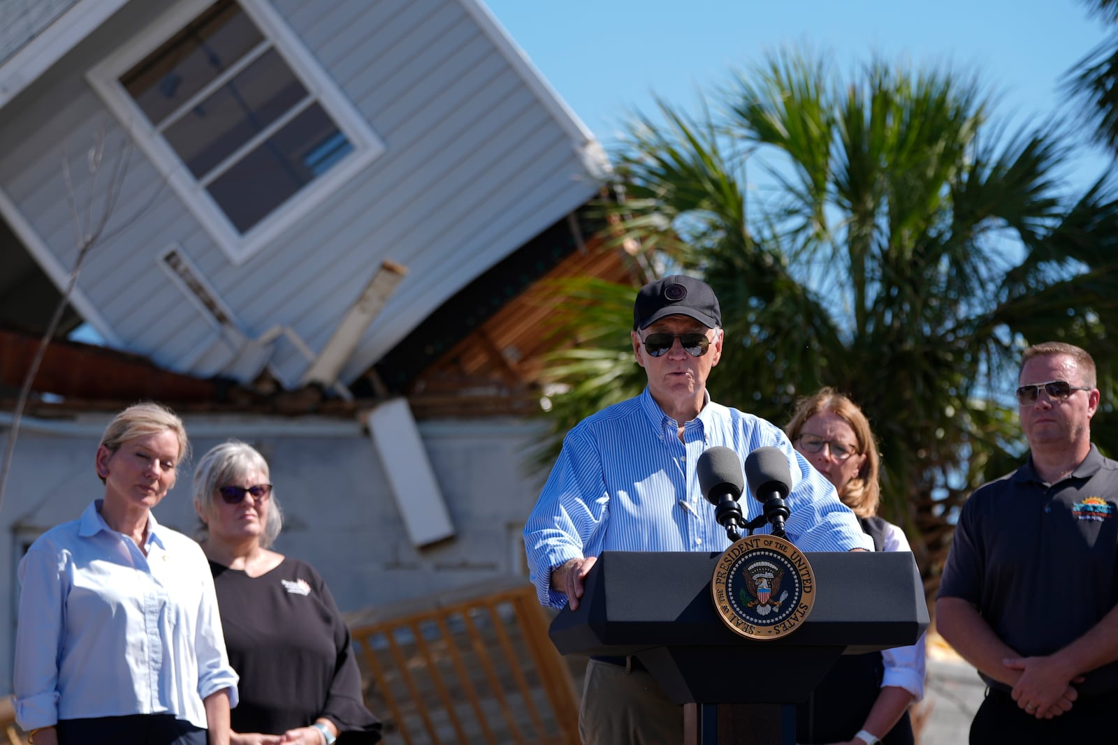 President Joe Biden speaks following a briefing by federal, state, and local officials in St. Pete Beach, Fla., during a tour of areas affected by Hurricane Milton, Sunday, Oct. 13, 2024. (AP Photo/Manuel Balce Ceneta)