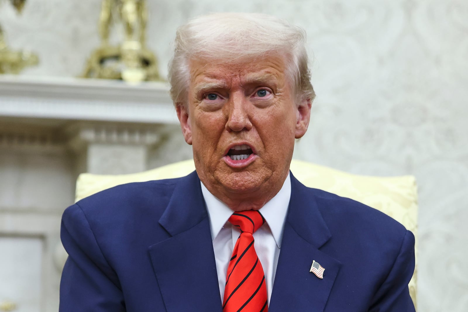 President Donald Trump talks as he meets NATO Secretary General Mark Rutte in the Oval Office at the White House in Washington, Thursday, March 13, 2025. (Pool via AP)