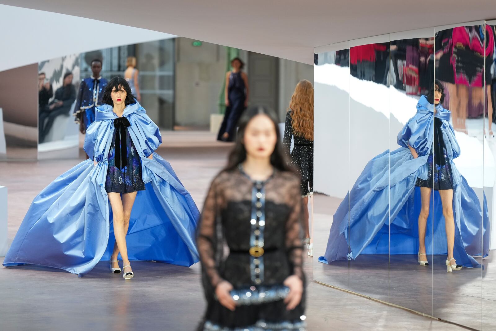 A model wears a creation as part of the Chanel Haute Couture Spring Summer 2025 collection, that was presented in Paris, Tuesday, Jan. 28, 2025. (AP Photo/Lewis Joly).