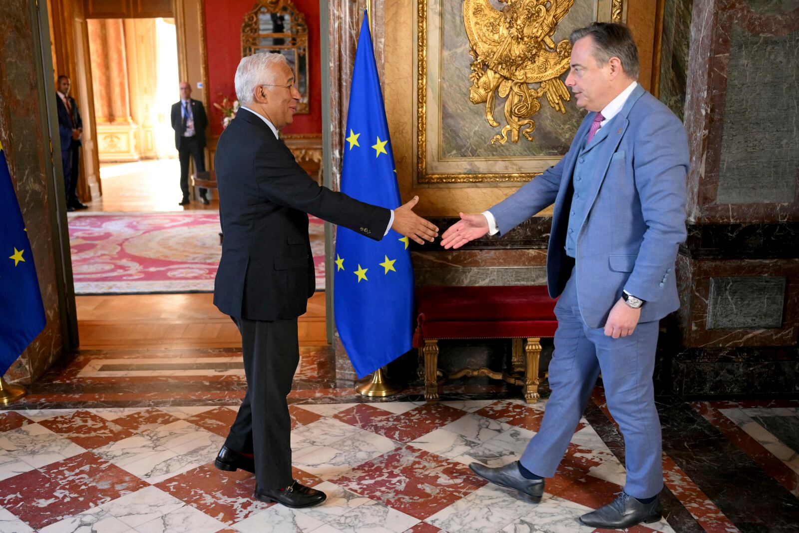 European Council President Antonio Costa, left, greets Belgium's Prime Minister Bart De Wever as he arrives for an EU summit at the Egmont Palace in Brussels, Monday, Feb. 3, 2025. (Nicolas Tucat, Pool Photo via AP)