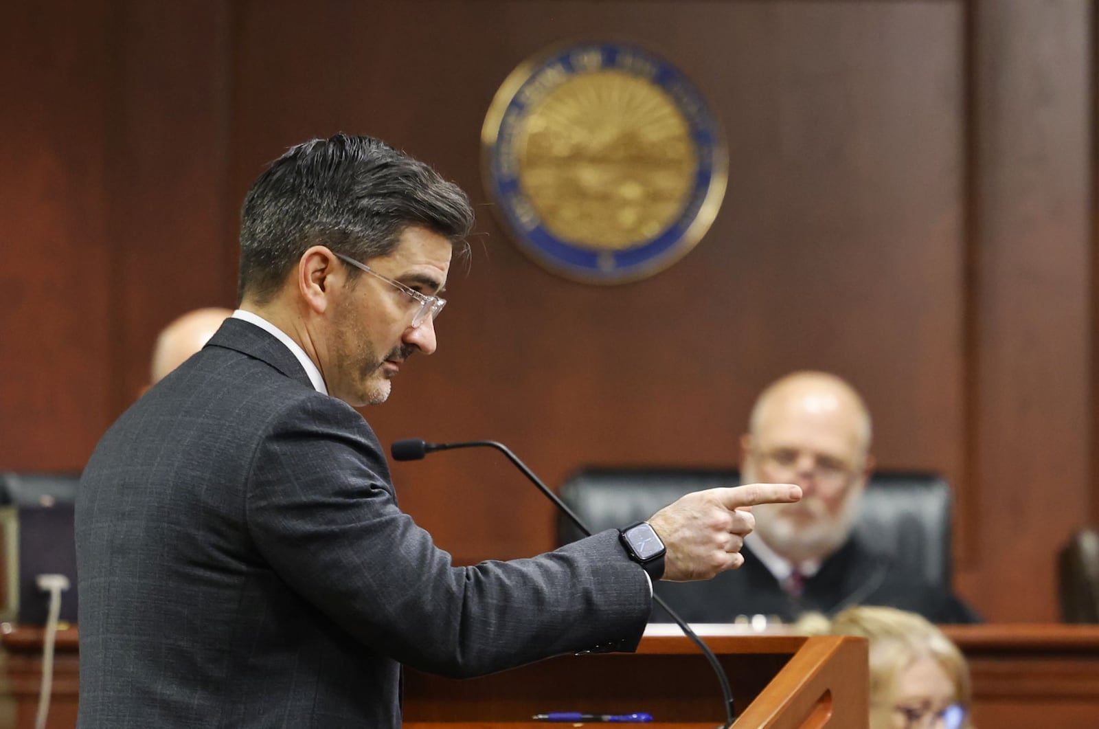 A three-judge panel listens to closing arguments by Assistant Prosecutor Josh Muennich Friday, May 10, 2024  in the retrial of Gurpreet Singh, indicted in the deaths of four family members in 2019 in their West Chester home.NICK GRAHAM/STAFF