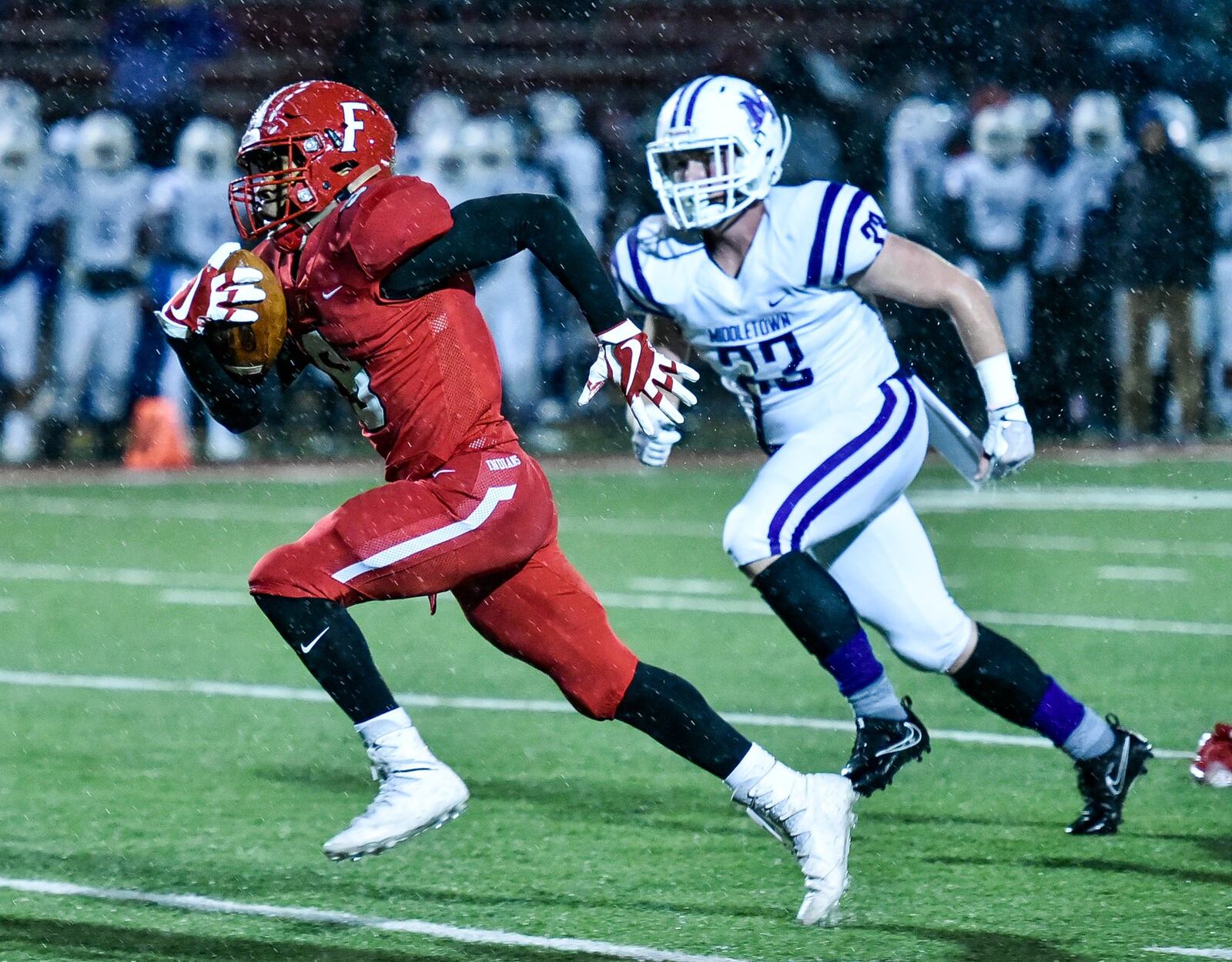 Fairfield’s JuTahn McClain carries the ball in for a touchdown during last Friday’s 48-0 victory over visiting Middletown at Fairfield Stadium. NICK GRAHAM/STAFF