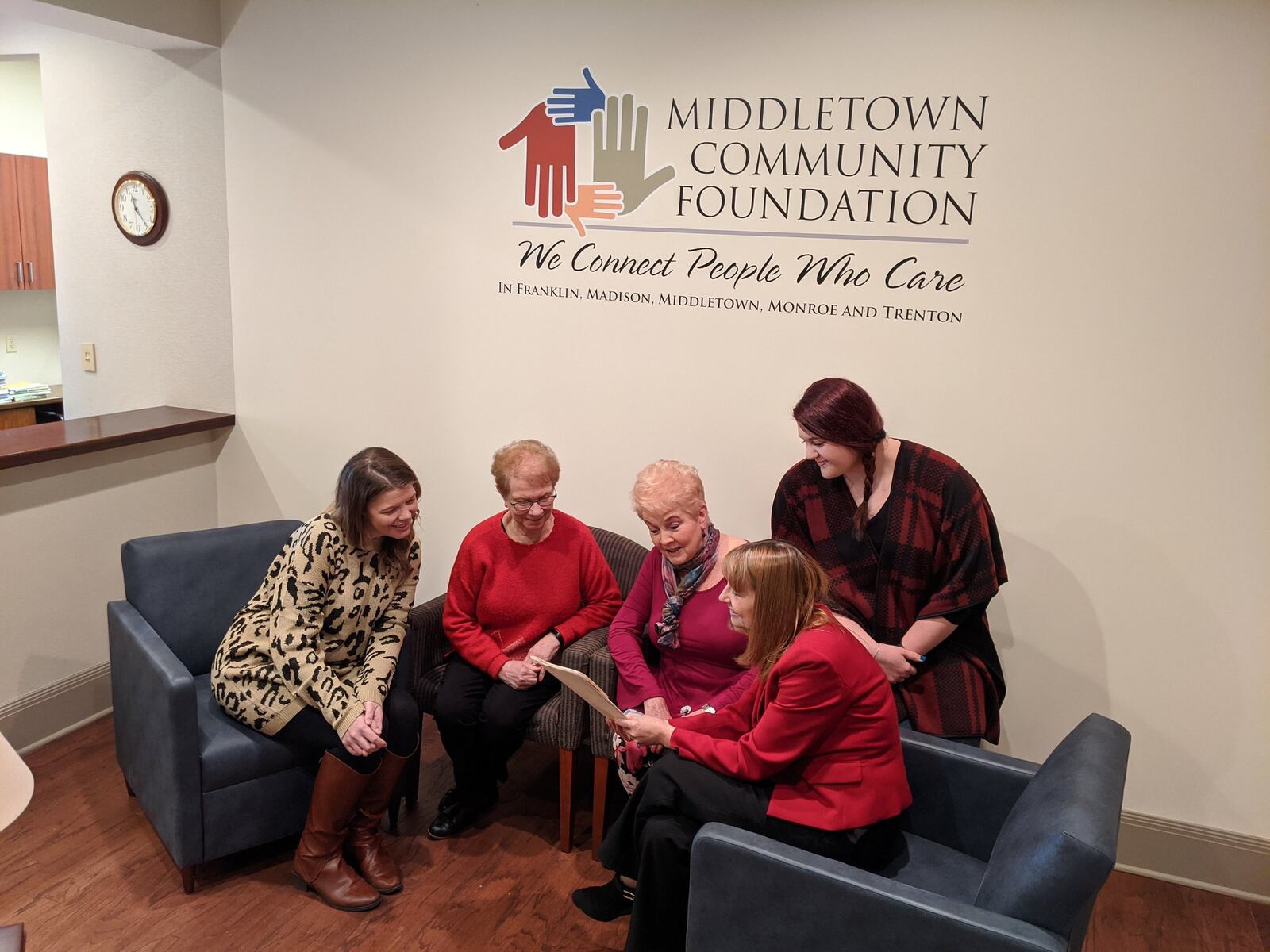 The Dolly Parton Imagination Library program was run for 12 years by the Middletown Community Foundation, and it was turned over in recent years to the public libraries in Middletown, Franklin and Springboro. From left: Cari Hillman, MidPointe Library; Ginger Bruggeman, Women Enriching Lives committee member; Fran Sack, WEL committee member; Allyson Doliboa, MidPointe Library; and Traci Barnett, Middletown Community Foundation. Missing from picture: Elaine Garver, WEL committee member; Rita Kolp, WEL committee member; and Travis Bautz, MidPointe Library. SUBMITTED PHOTO