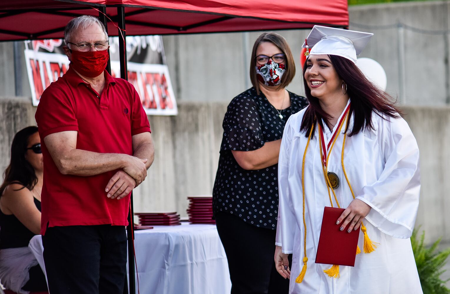 Madison High School drive-thru graduation ceremony at Land of Illusion