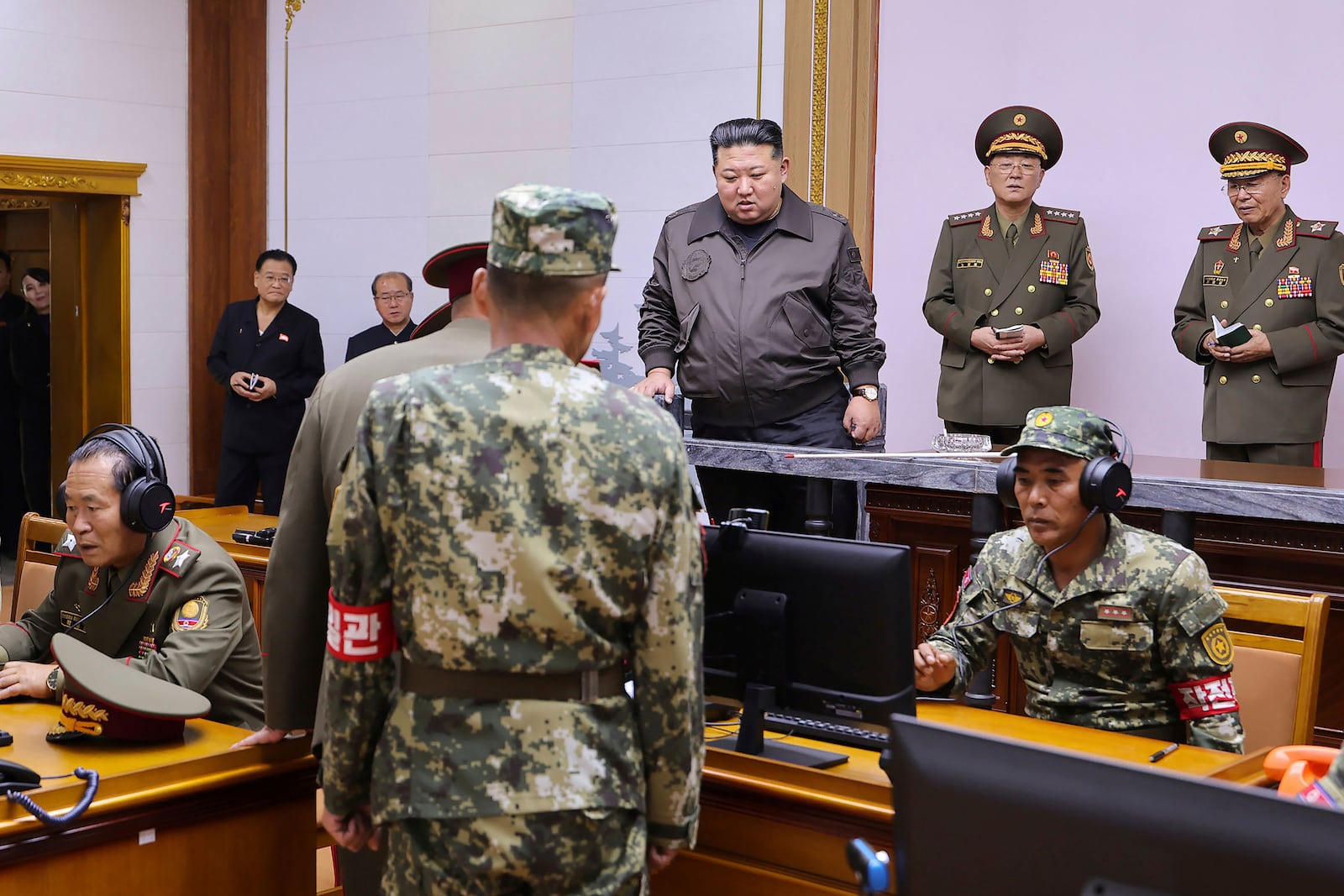 In this photo provided by the North Korean government, North Korean leader Kim Jong Un, center, visits the headquarters of the North Korean People’s Army’s 2nd Corps at an undisclosed place in North Korea Thursday, Oct. 17, 2024. Independent journalists were not given access to cover the event depicted in this image distributed by the North Korean government. The content of this image is as provided and cannot be independently verified. 8(Korean Central News Agency/Korea News Service via AP)