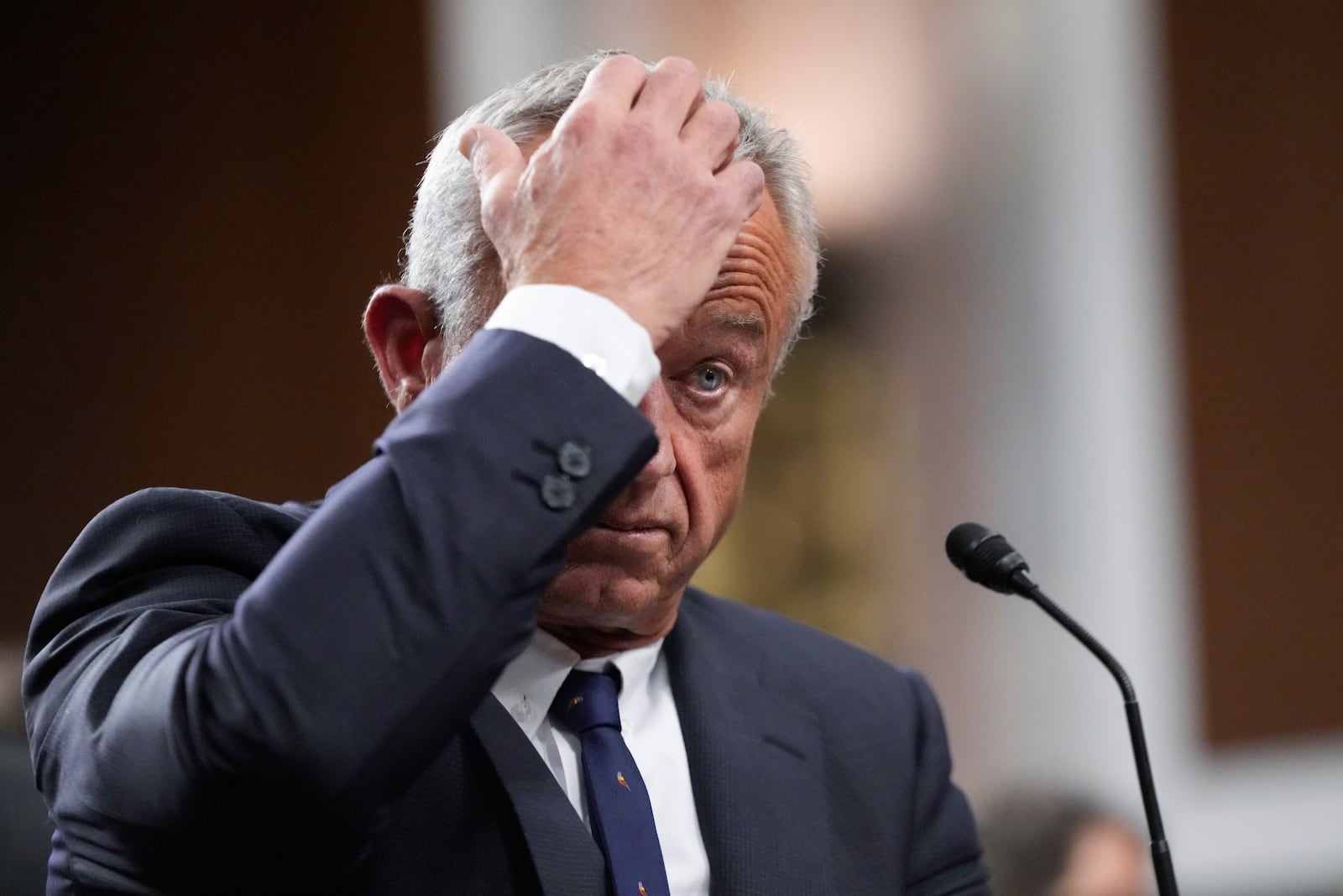 Robert F. Kennedy Jr., President Donald Trump's choice to be Secretary of Health and Human Services, appears before the Senate Finance Committee for his confirmation hearing, at the Capitol in Washington, Wednesday, Jan. 29, 2025. (AP Photo/Ben Curtis)