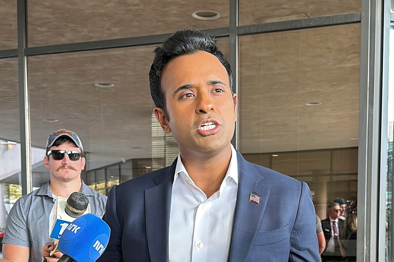 FILE - Biotech entrepreneur and former Republican presidential candidate Vivek Ramaswamy speaks with reporters ahead of a town hall, Sept. 19, 2024, in Springfield, Ohio. (AP Photo/Julie Carr Smyth, File)