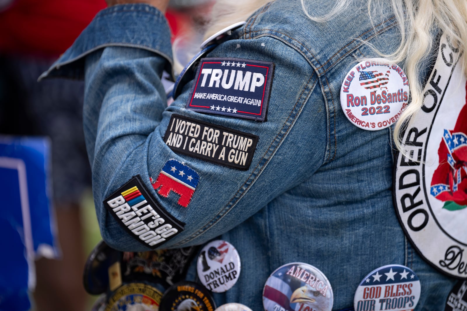 Supporters of President Donald Trump gather for a Presidents Day rally near the Trump International Golf Club, Monday, Feb. 17, 2025, in West Palm Beach, Fla. (AP Photo/Ben Curtis)