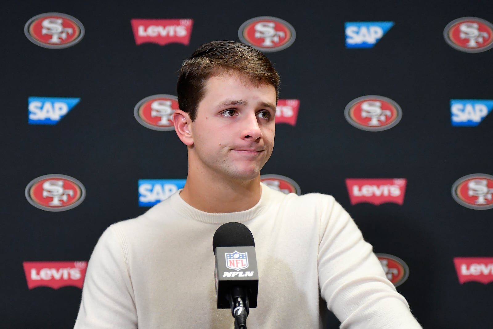 San Francisco 49ers quarterback Brock Purdy speaks at a news conference after an NFL football game against the Buffalo Bills in Orchard Park, N.Y., Sunday, Dec. 1, 2024. (AP Photo/Adrian Kraus)