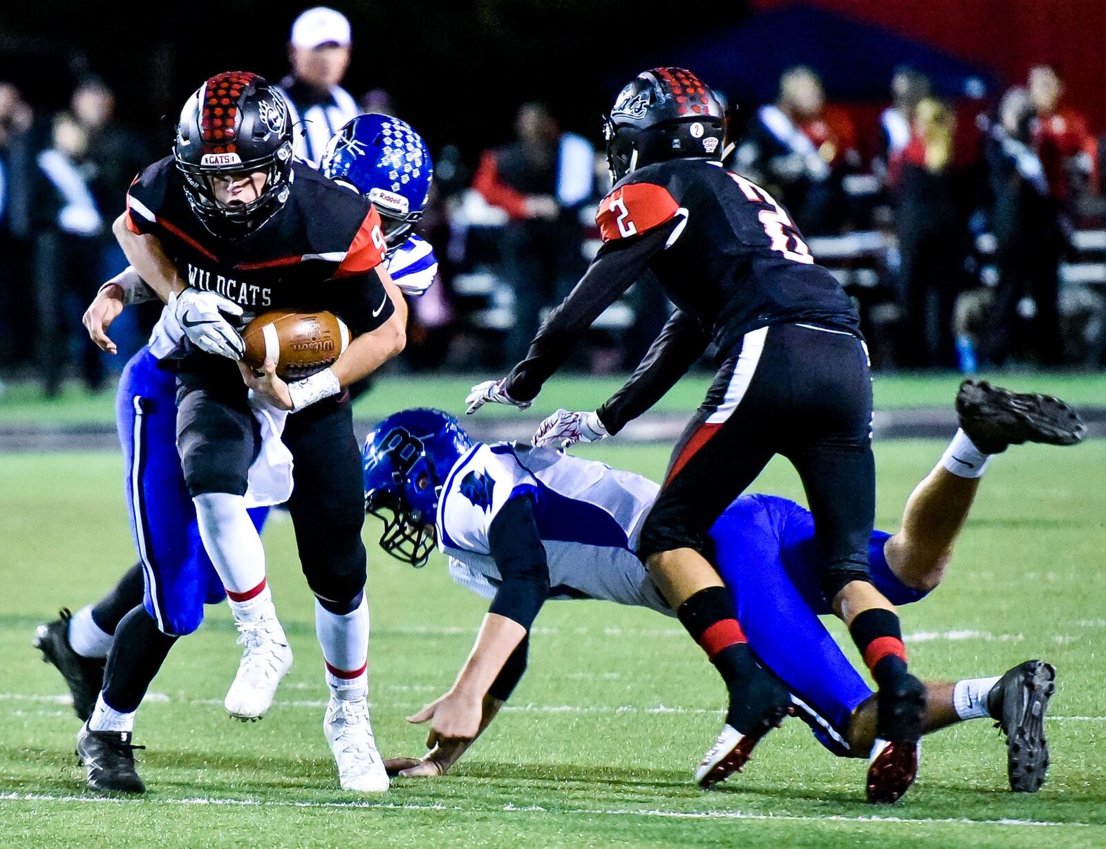 Franklin’s Braden Woods runs the ball on a quarterback keeper during an Oct. 26 game against Brookville at Atrium Stadium in Franklin. The host Wildcats won 24-21. NICK GRAHAM/STAFF