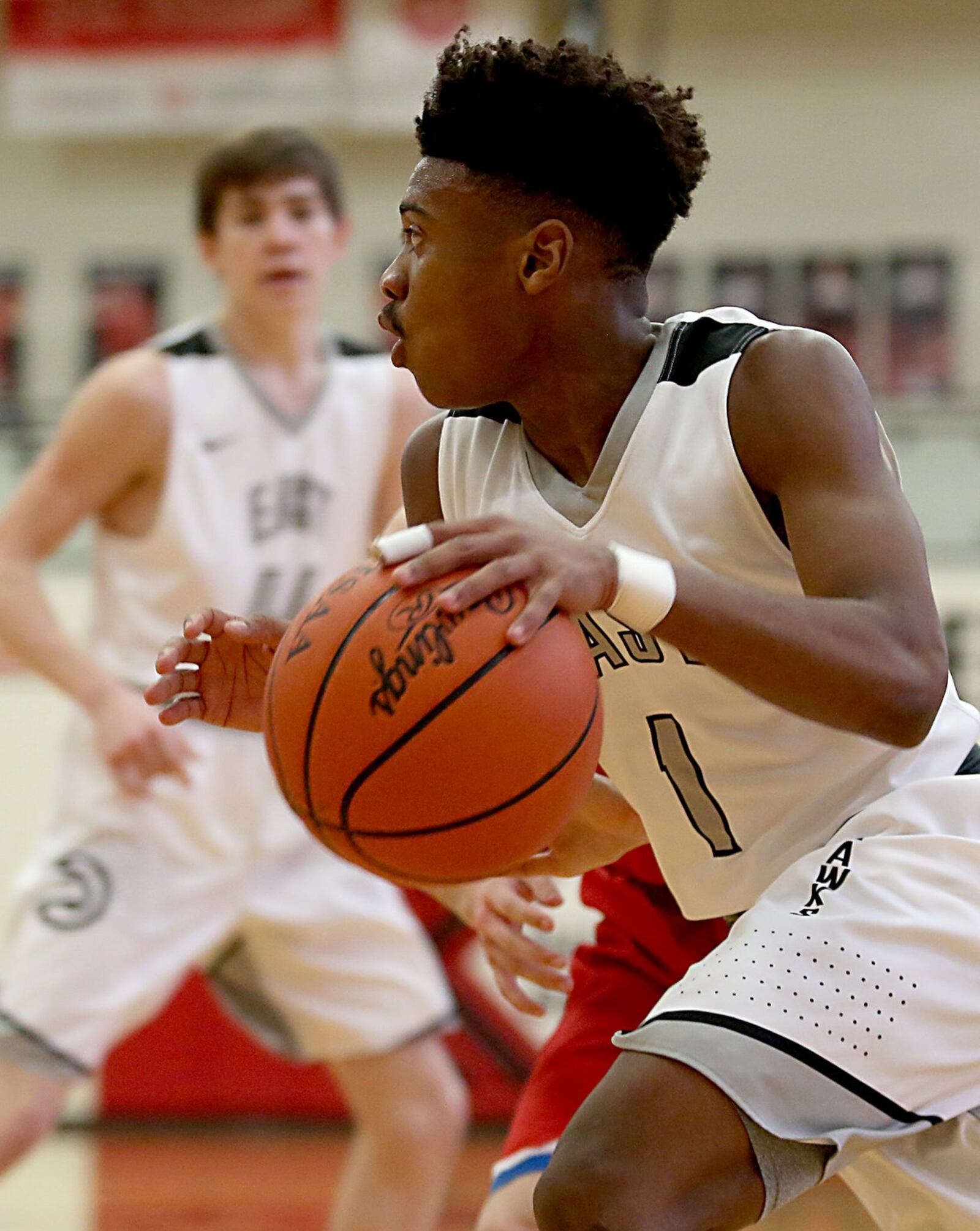 Lakota East guard Jalen Peck drives into the paint against Kings during their Division I sectional game at Lakota West on Wednesday night. CONTRIBUTED PHOTO BY E.L. HUBBARD