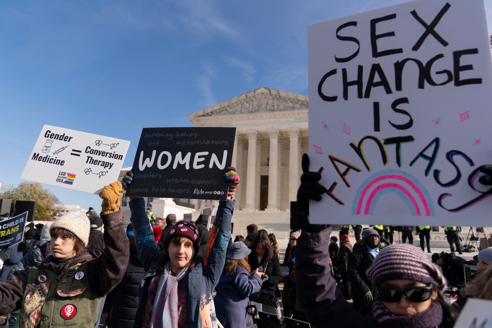 FILE - Demonstrators against transgenders rights protest during a rally outside of the Supreme Court, Wednesday, Dec. 4, 2024, in Washington, as arguments begin in a case regarding a Tennessee law banning gender-affirming medical care for transgender youth. (AP Photo/Jose Luis Magana, File)